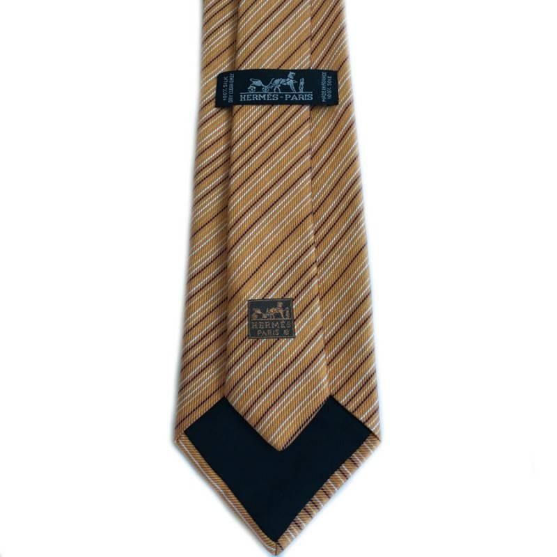 Brown HERMES Tie in Orange Silk with White, Yellow and Black Stripes