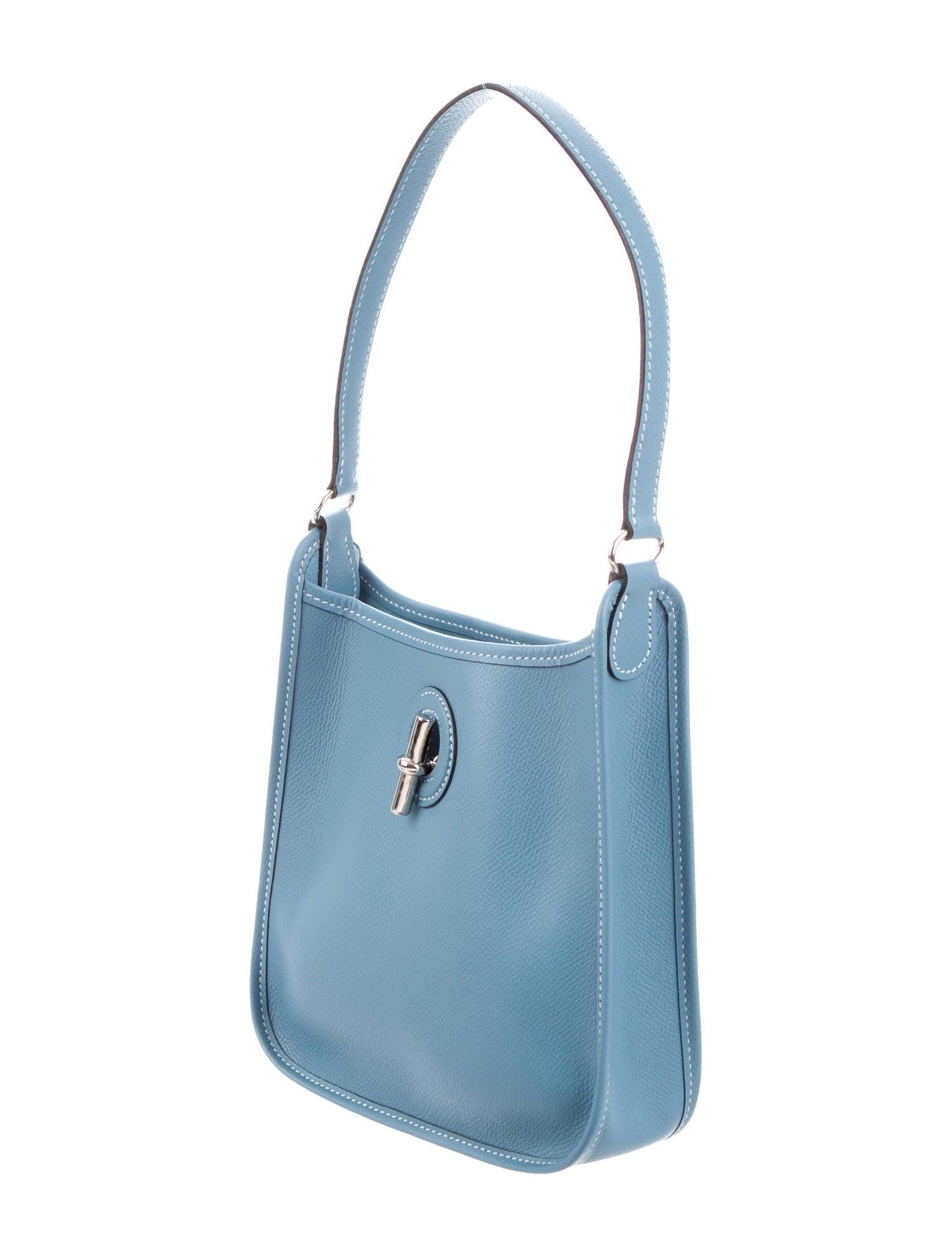 Hermes Tiffany Baby Blue Leather Palladium Toggle Top Handle Satchel Small Mini Shoulder Bag

Leather 
Palladium-plated hardware
Suede lining 
Toggle closure 
Made in France
Measures 7