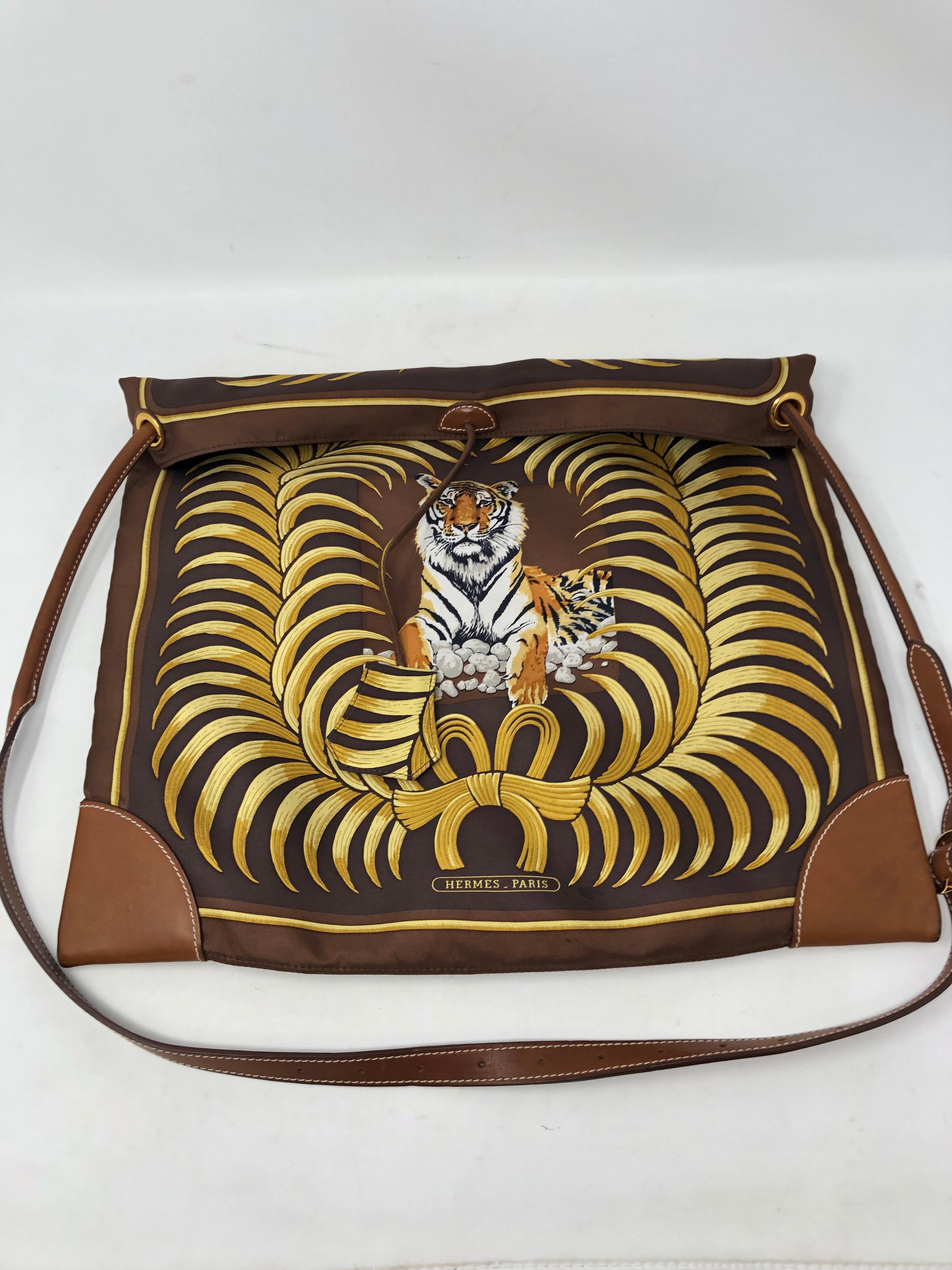 Hermes Tiger Silk City Bag. Beautiful silk and leather crossbody and shoulder bag by Hermes. Rare style that was featured in 