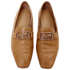 HERMES Tiempo mocasines planos de cuero marrón liso con hebilla de carruaje de caballo EU35