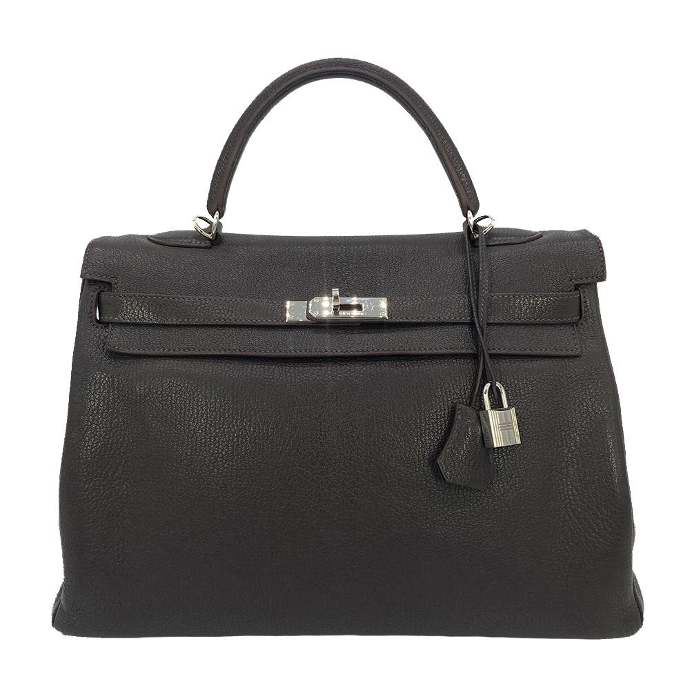 Hermes Brown Togo Kelly 35 Retourne Silver PDH in ottime condizioni. Esterno in pelle togo marrone cioccolato con finiture in palladio argento. La chiusura superiore a doppio cinturino si apre su un interno in pelle marrone abbinato, con una tasca