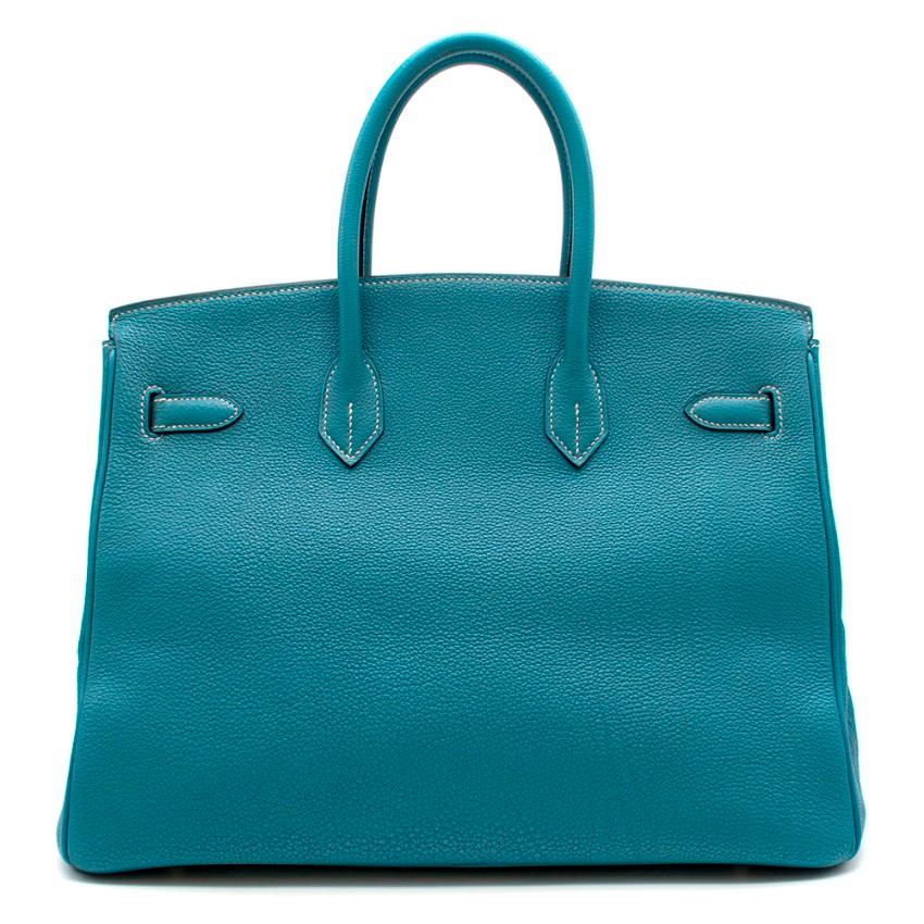 Hermes Togo Leather Blue Jean Birkin 35 PHW

- Age [G] 2003

Two Rolled leather handles
discontinued blue jean colour
White contrast stitching
One inside slip pocket
Palladium plated hardware
Clochette, lock & keys included

Please note, these items