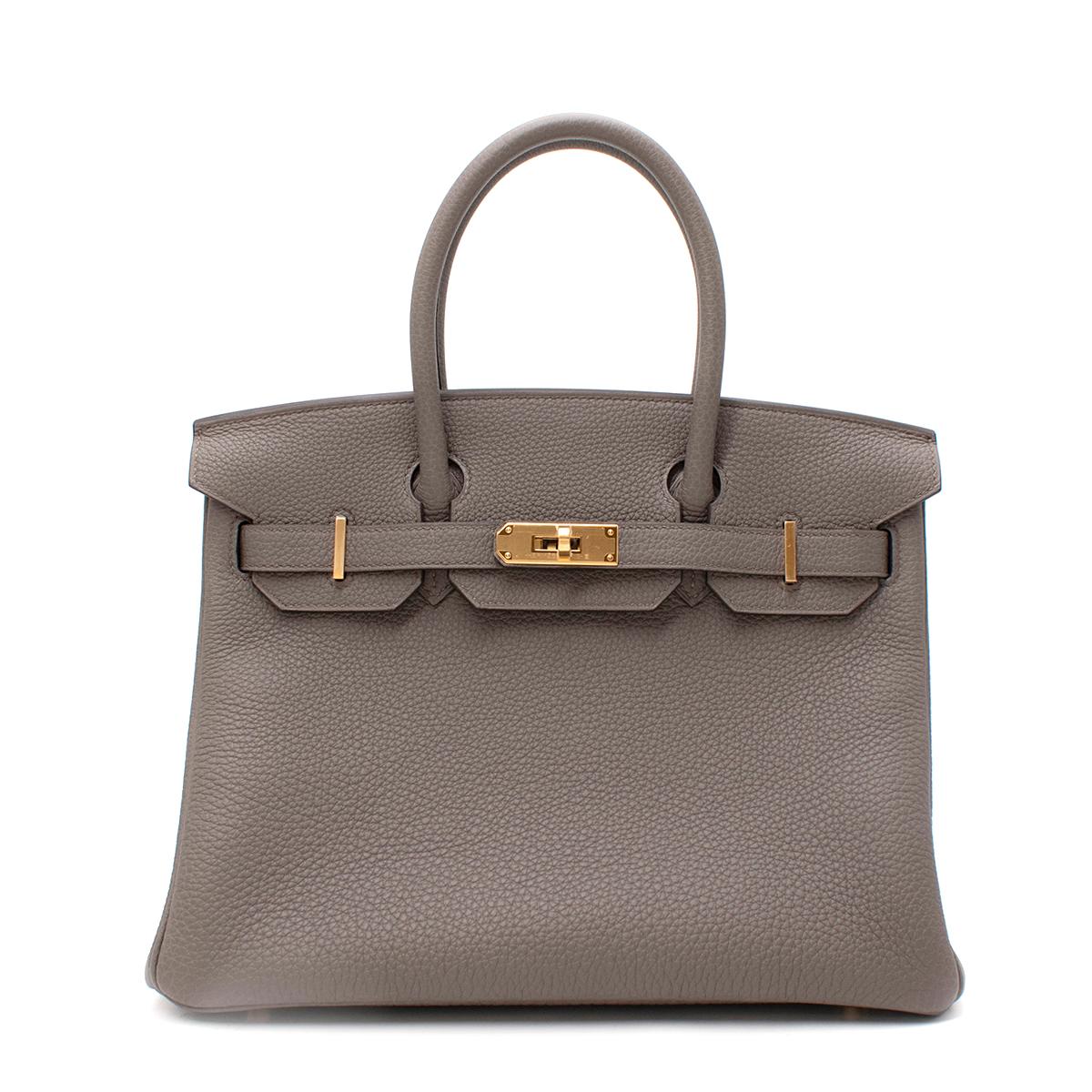 Hermes Togo Leather Etain Birkin 30 GHW

Age Z 2021

- Chic Etain warm-grey Birkin 30 rendered in grained Togo leather
- Bright gold-tone hardware illuminates the matte grey leather and provides a chic focal point
- Full set with stickers still on