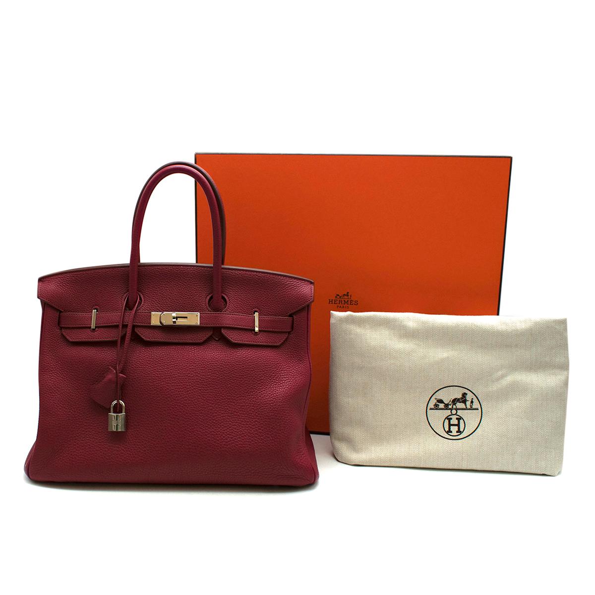 Hermes Togo Leather Rubis Birkin 35 PHW

The most desired Hermes bag, the Birkin is a timeless style with a better investment rate than Gold! This 35, the most popular style is in a soft ruby red which contrasts beautifully with the palladium plated