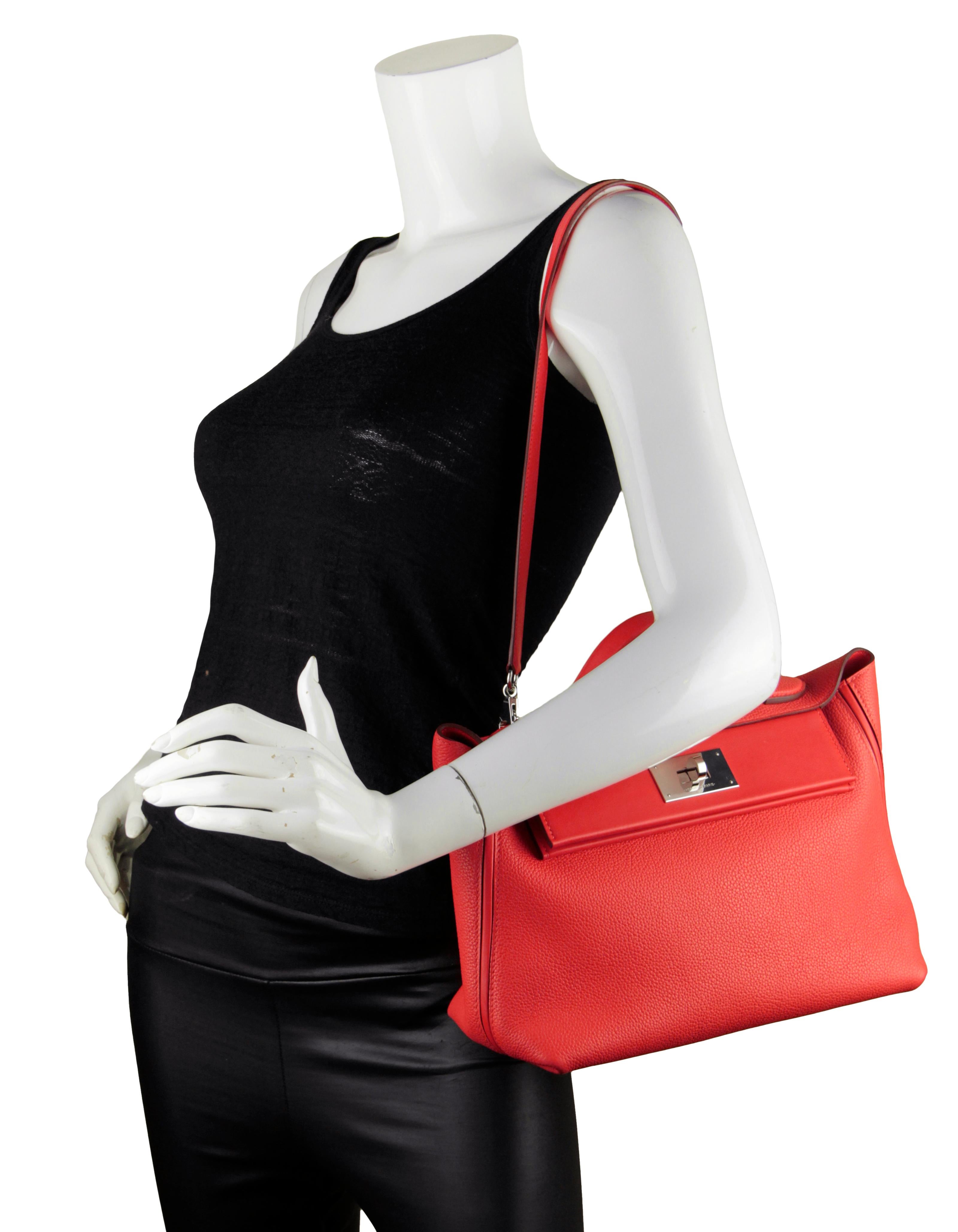 Hermes Togo/Swift Leather Capucine 29cm 24/24 Bag

Made In: France
Year of Production: 2019
Color: Capucine- coral
Hardware: Silvertone palladium
Materials: Togo and swift leather
Lining: Capucine swift leather
Closure/Opening: Flap top with twist