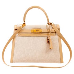 Hermès - Sac Kelly 28 cm en toile et cuir beige Swift