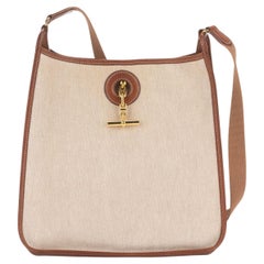 Hermès Toile and Gold Leather Vespa Bag