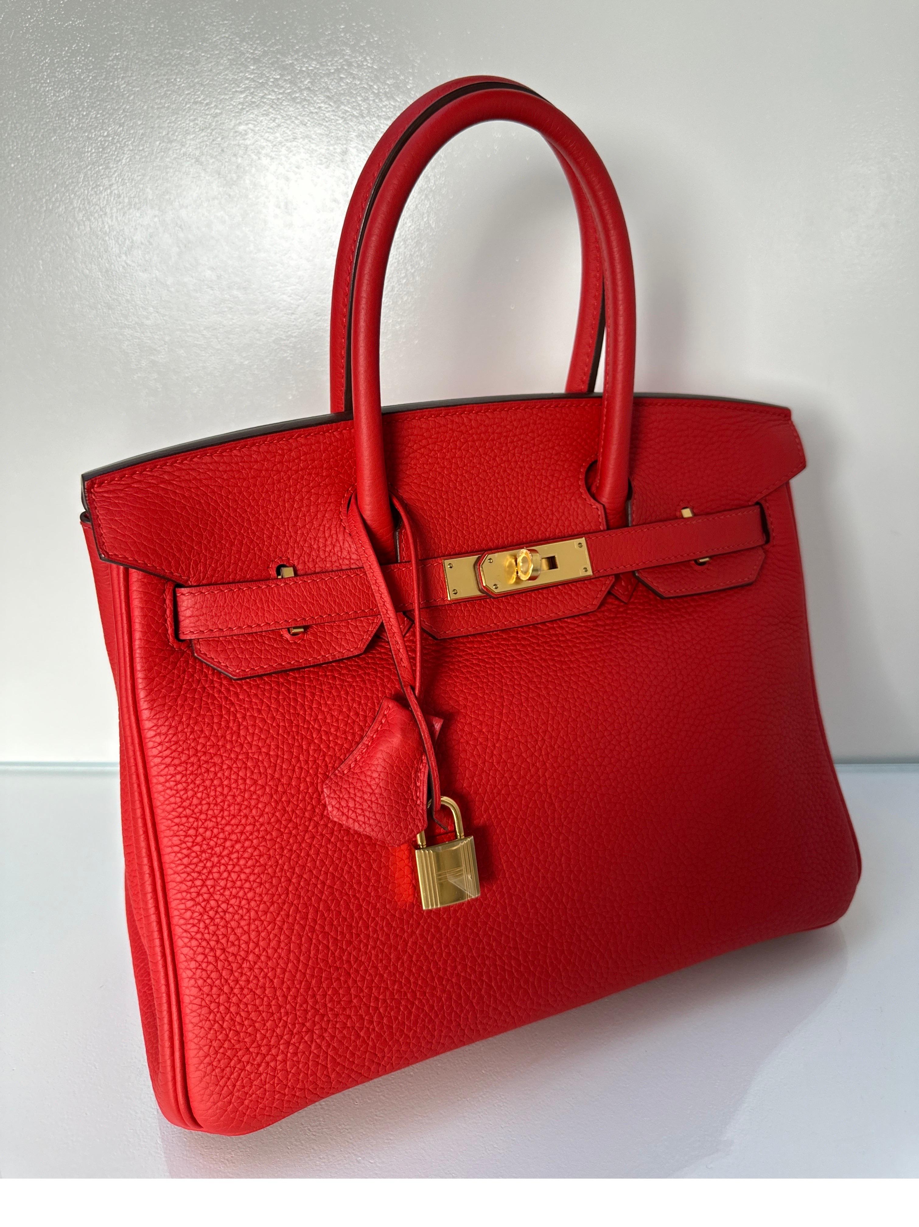 Hermes Tomate Birkin 30 Bag. Beautiful tomato red Birkin bag with gold hardware. Togo leather. Excellent condition. Interior clean. Bag looks like new. Includes clochette, lock, keys, and dust bag. Guaranteed authentic. 