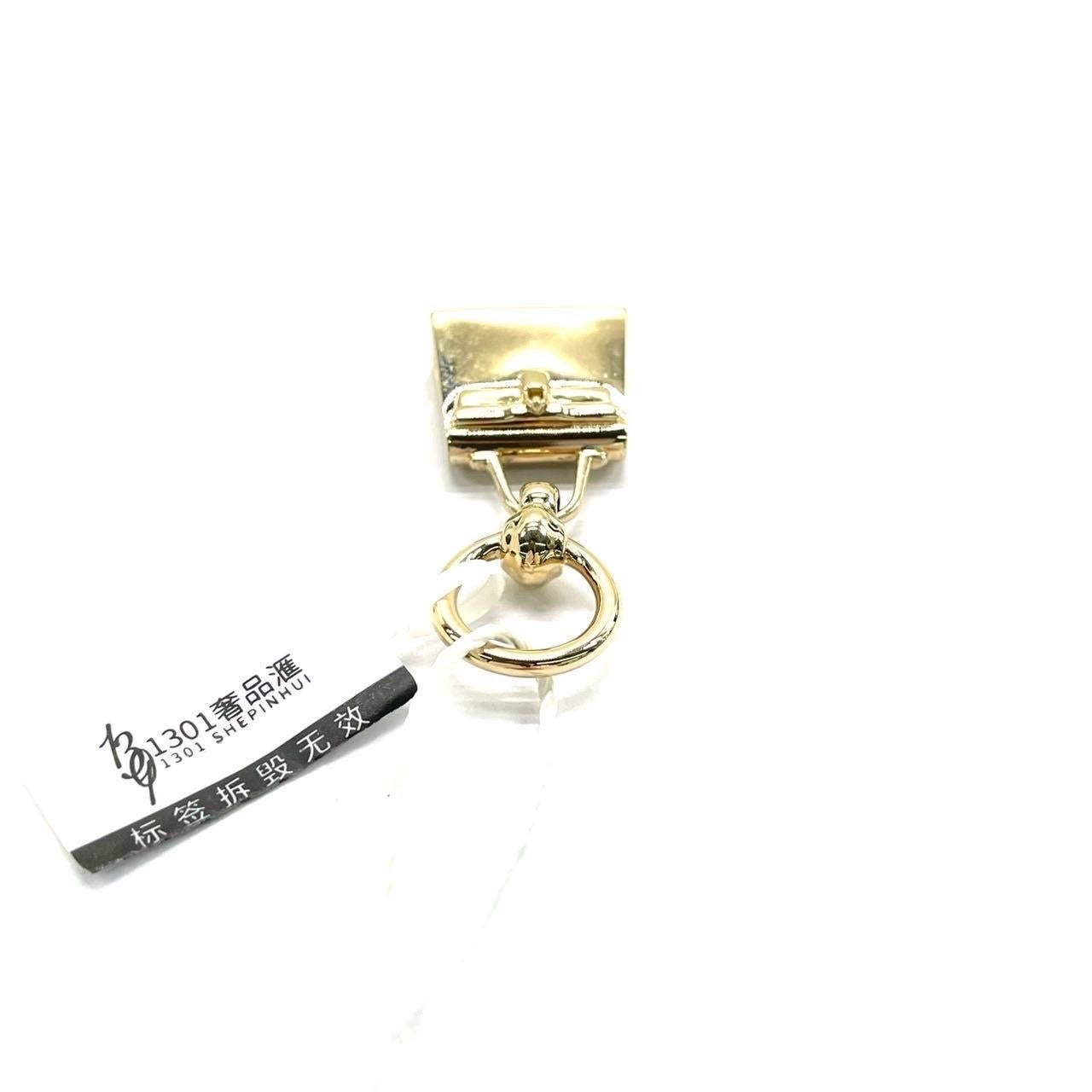 Hermès Top Kelly Ciondolo Oro Rosa Collana Charm In condizioni ottime in vendita a AUBERVILLIERS, FR