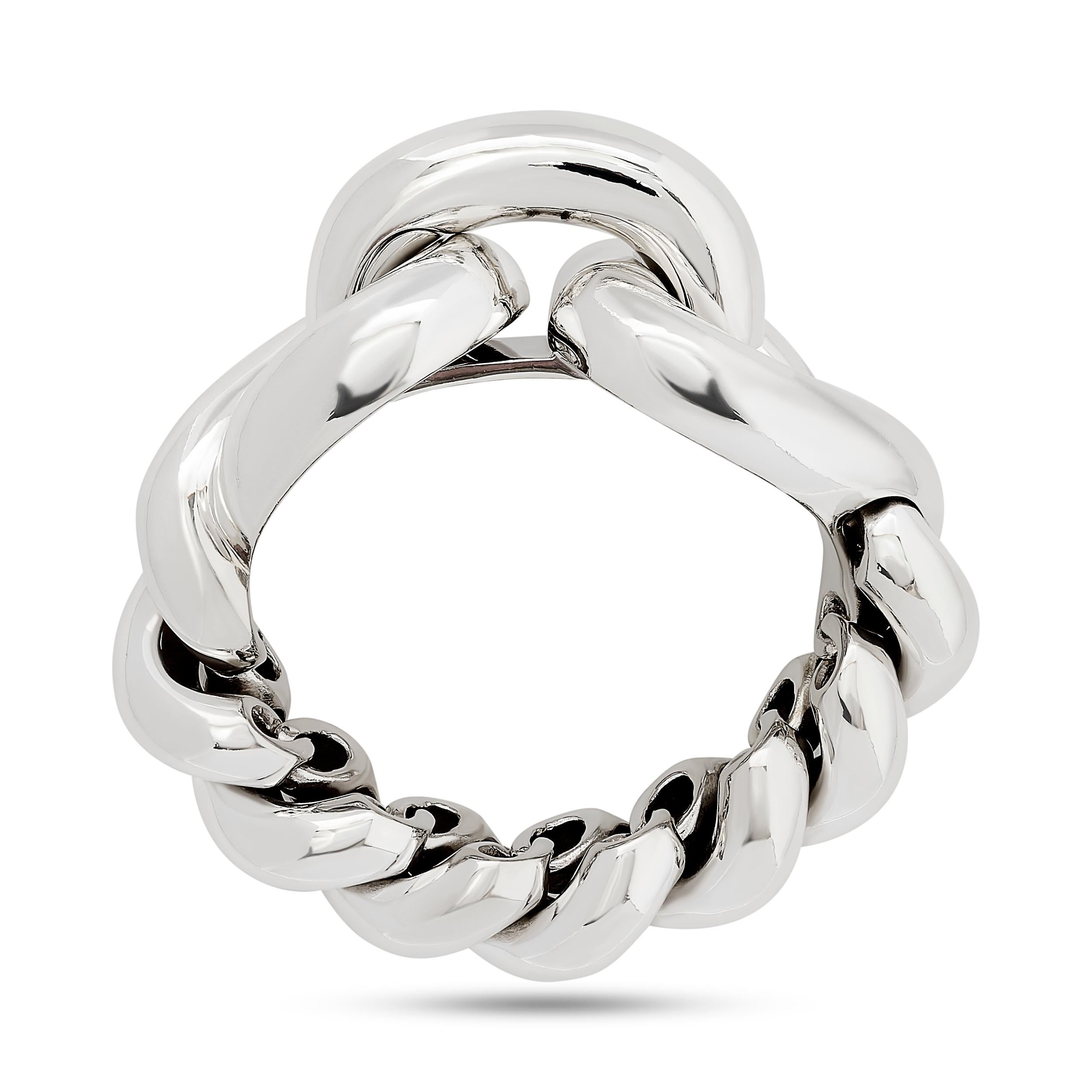 The Hermès Torsade chunky silver twisted bracelet showcases a bold and eye-catching design, with its intricate twists and turns, adding a touch of sophistication and statement on any wrist.

125.3 DWT.
Stamped 