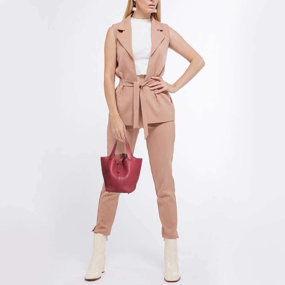 Experience luxury with this authentic Hermes Picotin Lock 18 bag. Meticulously crafted with the best materials its a timeless piece that will elevate any outfit.