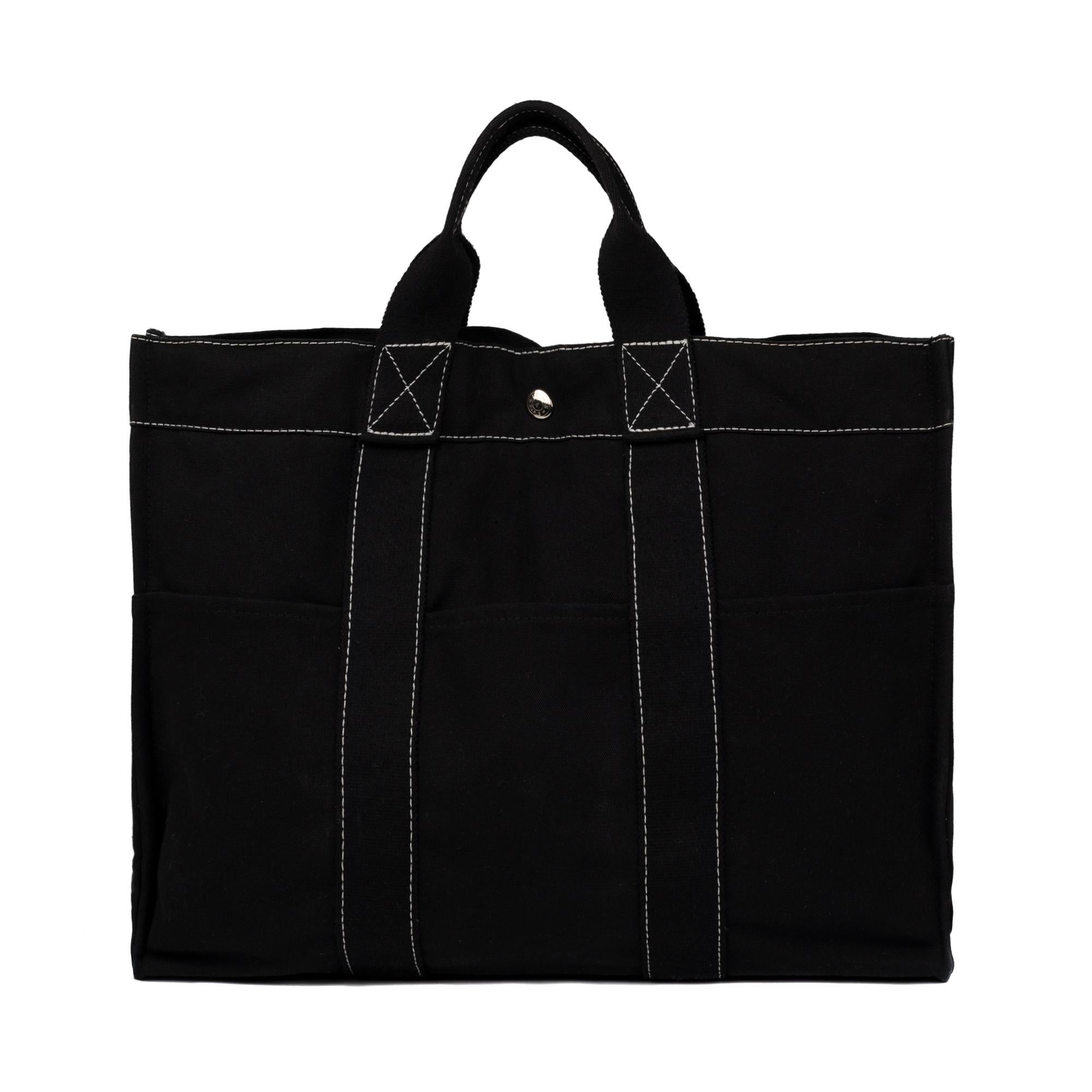 Brand: Hermes 
Model: Toto
Material: Canvas
Color: Black
Dimensions: 41.5x30.5x10 Cm
Condition: Very good
Packaging: Original box