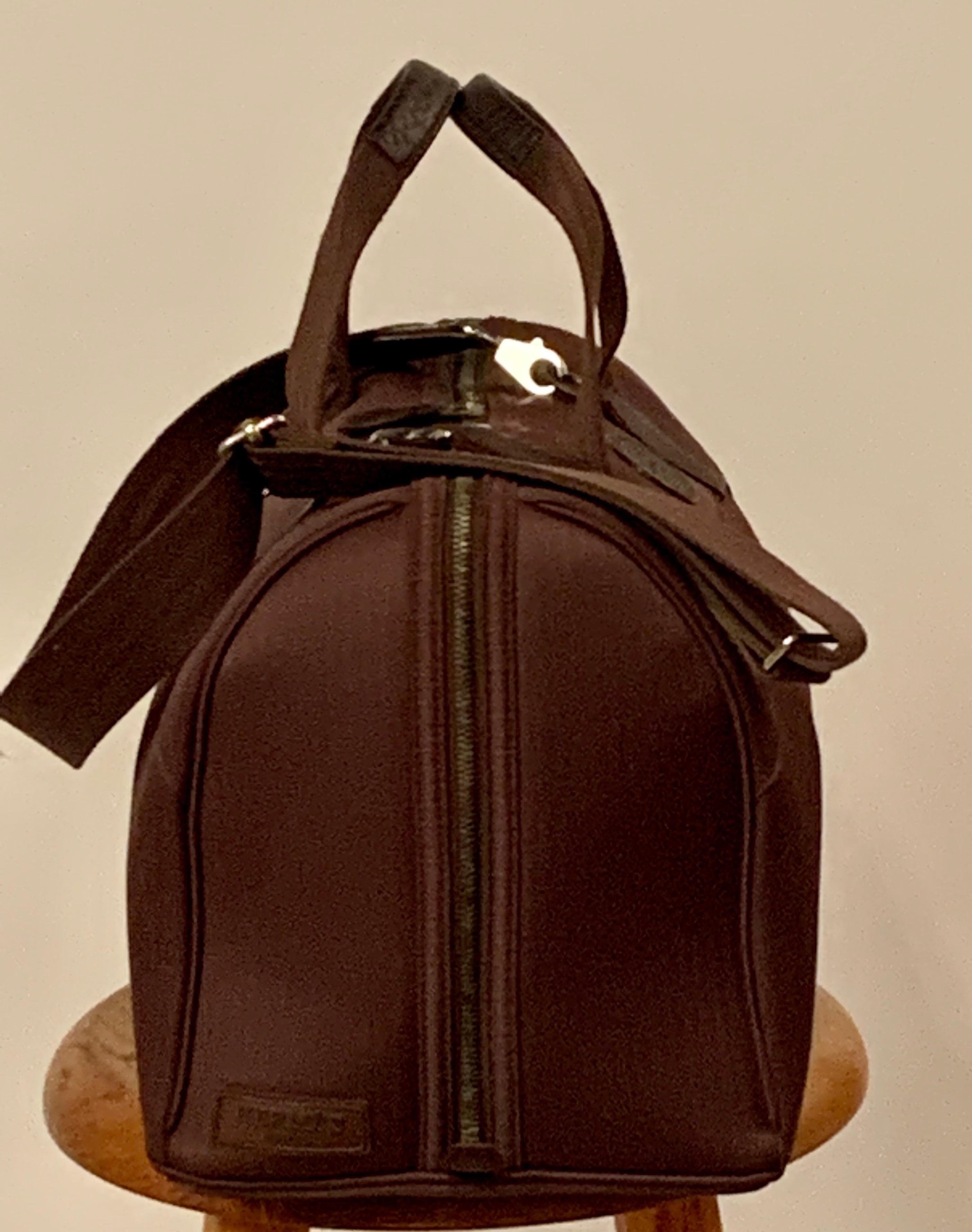 This Tou Tou pet carrier from Hermes is so luxurious, and every detail is so well thought out for the comfort of your pet.
The bag has leather accents and one end is all leather with round vents for fresh air and a view.  The bag has an adjustable