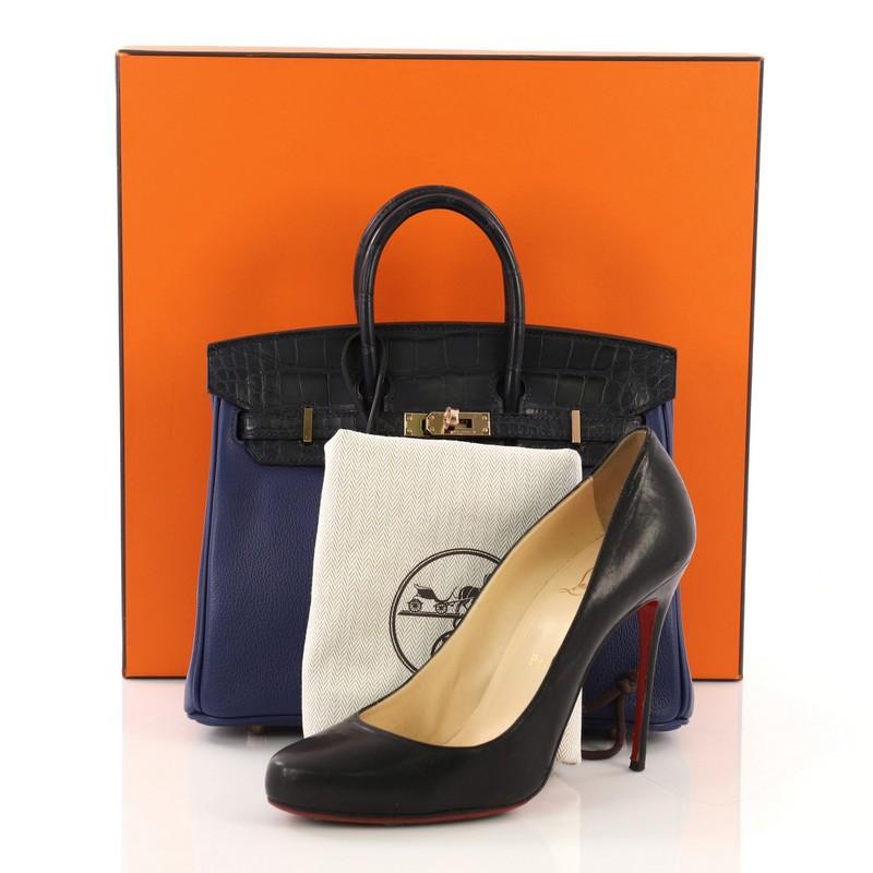 This Hermes Touch Birkin Handbag Blue Novillo with Blue Matte Alligator with Gold Hardware 25, crafted in Bleu Saphir Novillo leather with genuine Bleu Marine blue Matte Alligator, features dual rolled handles and rose gold hardware. Its turn-lock