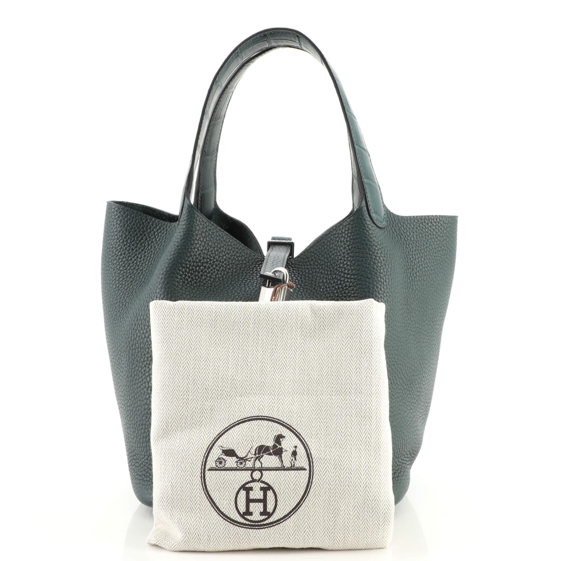 Condition: Great. Creasing on exterior, light wear on handles and in interior, scratches on hardware.
Accessories: Lock, Dust Bag, Keys
Measurements: Handle Drop 6