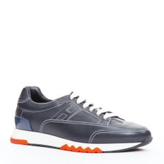 HERMES Trail navy calf leather orange accent colorblock sneakers EU41