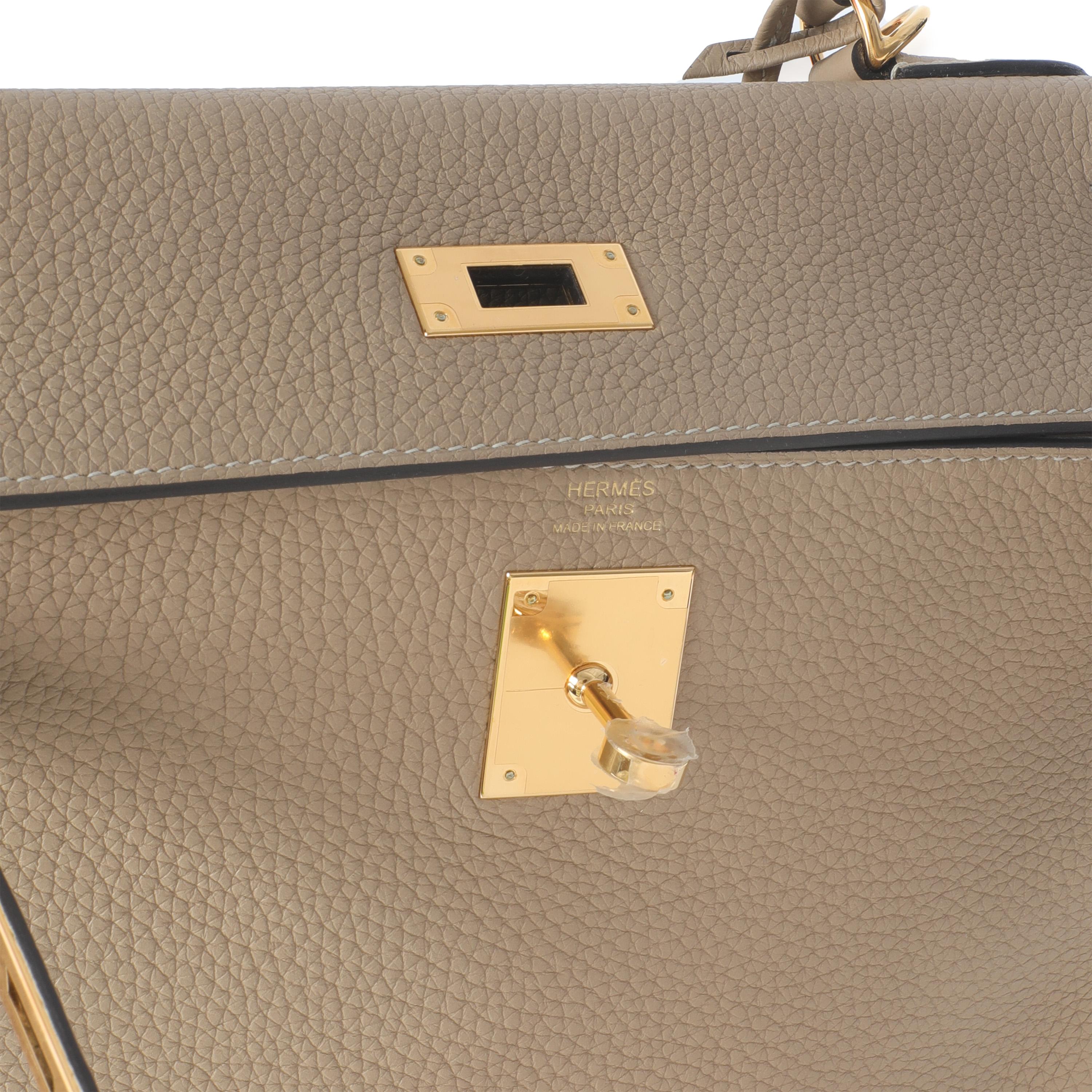 Donna Hermès Trench Clemence Retourne Kelly 28 GHW in vendita
