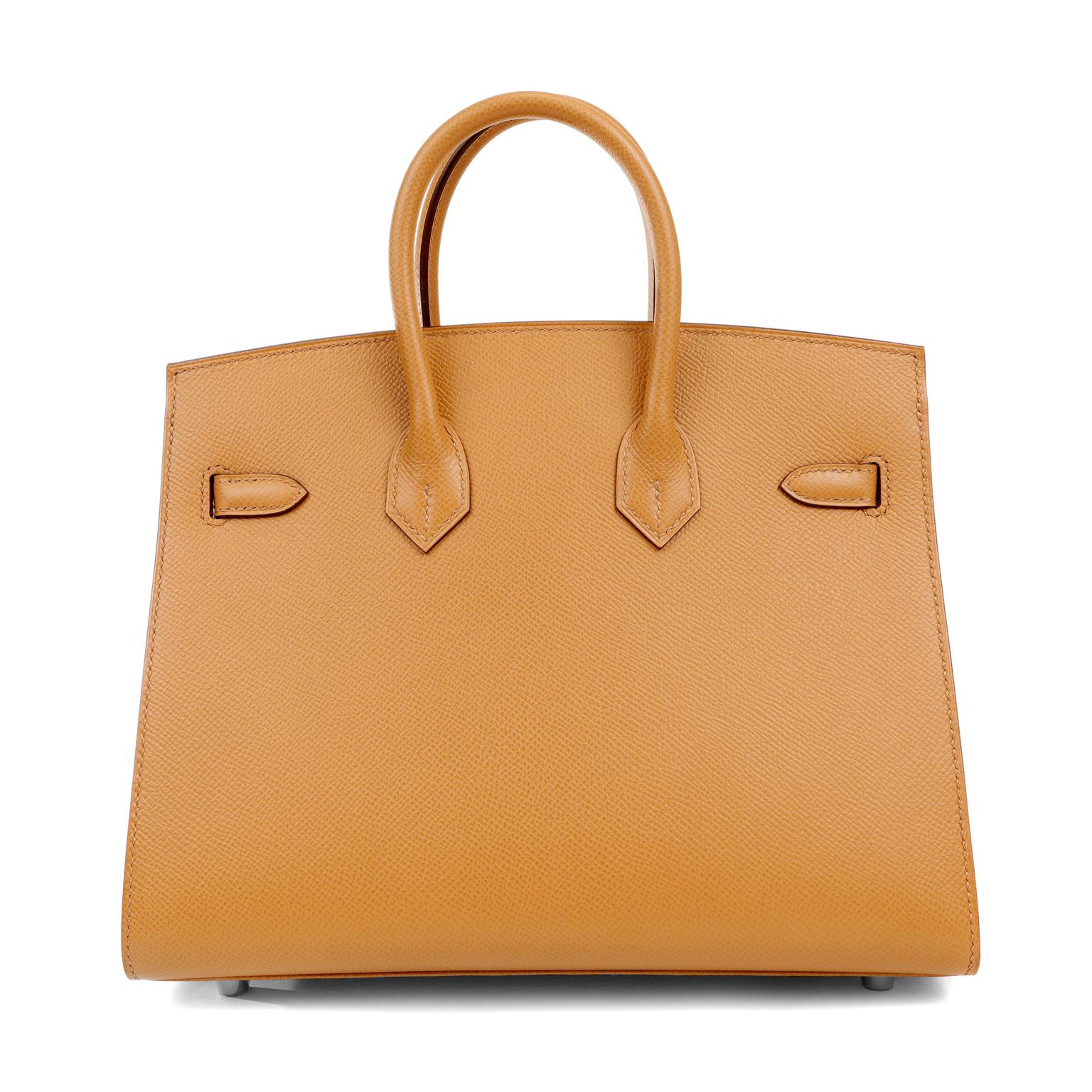 This authentic Hermès Trench Epsom 25 cm Sellier Birkin is in pristine unworn condition; the protective plastic is still intact on the hardware.    Considered the ultimate luxury item, the Hermès Birkin is stitched by hand. Waitlists are commonplace