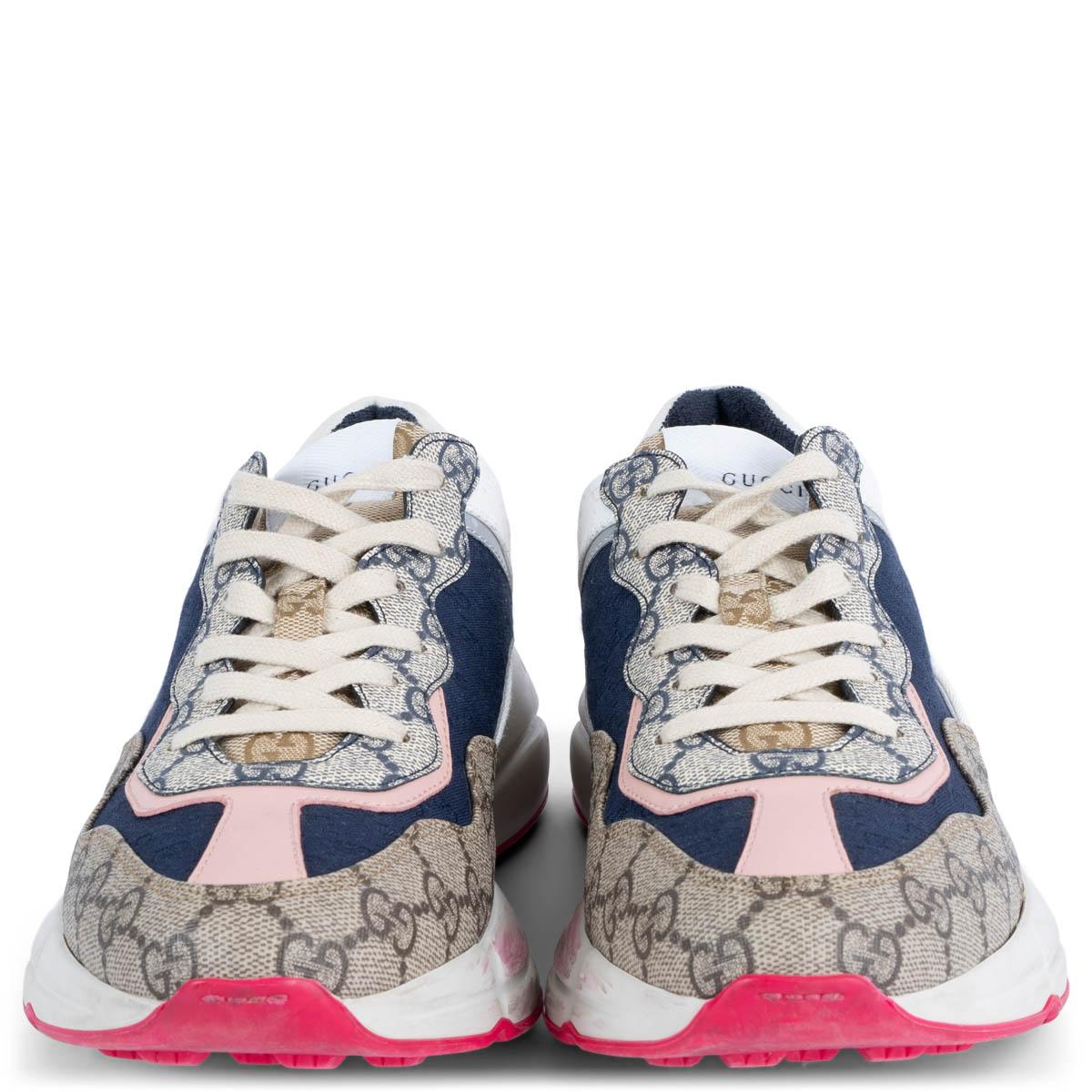 100% authentic Gucci 2020 Rhyton sneakers in beige, rose pink, white and navy blue GG Supreme canvas set on a chunky white and pink rubber sole. Have been worn and show marks on the inner side of the white sole. Overall in very good condition.