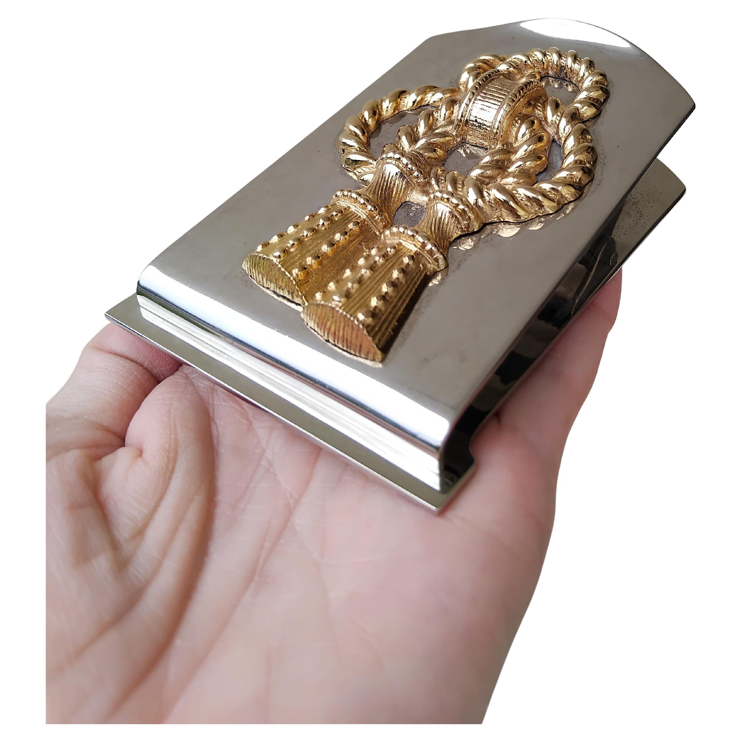 Exceptional and Rare Authentic Hermès Paper Clip

Limited edition numbered 38819

Designed by Ravinet d'Enfert for Hermès

Vintage item

Body in silver-tone metal, top decorated with golden metal trimmings

Colorways: silvery, golden


