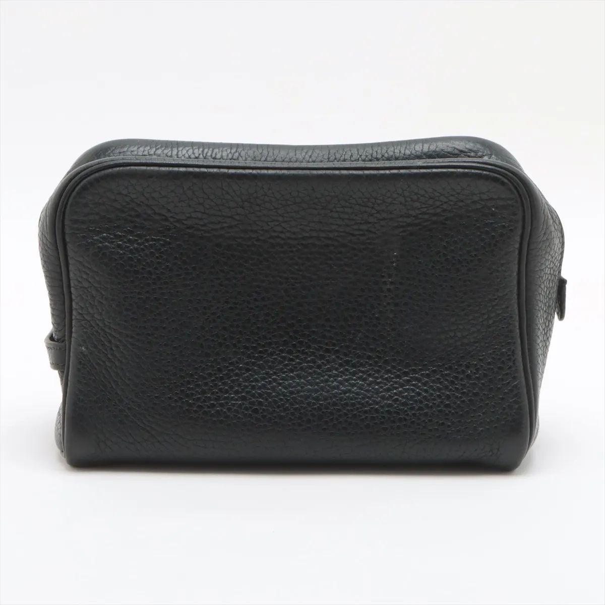 The Hermès Trousse Victoria PM Pouch in black is a sleek and versatile accessory crafted with the brand’s renowned attention to detail. Made from durable and finely togo leather, the pouch features a minimalist design with subtle elegance. The
