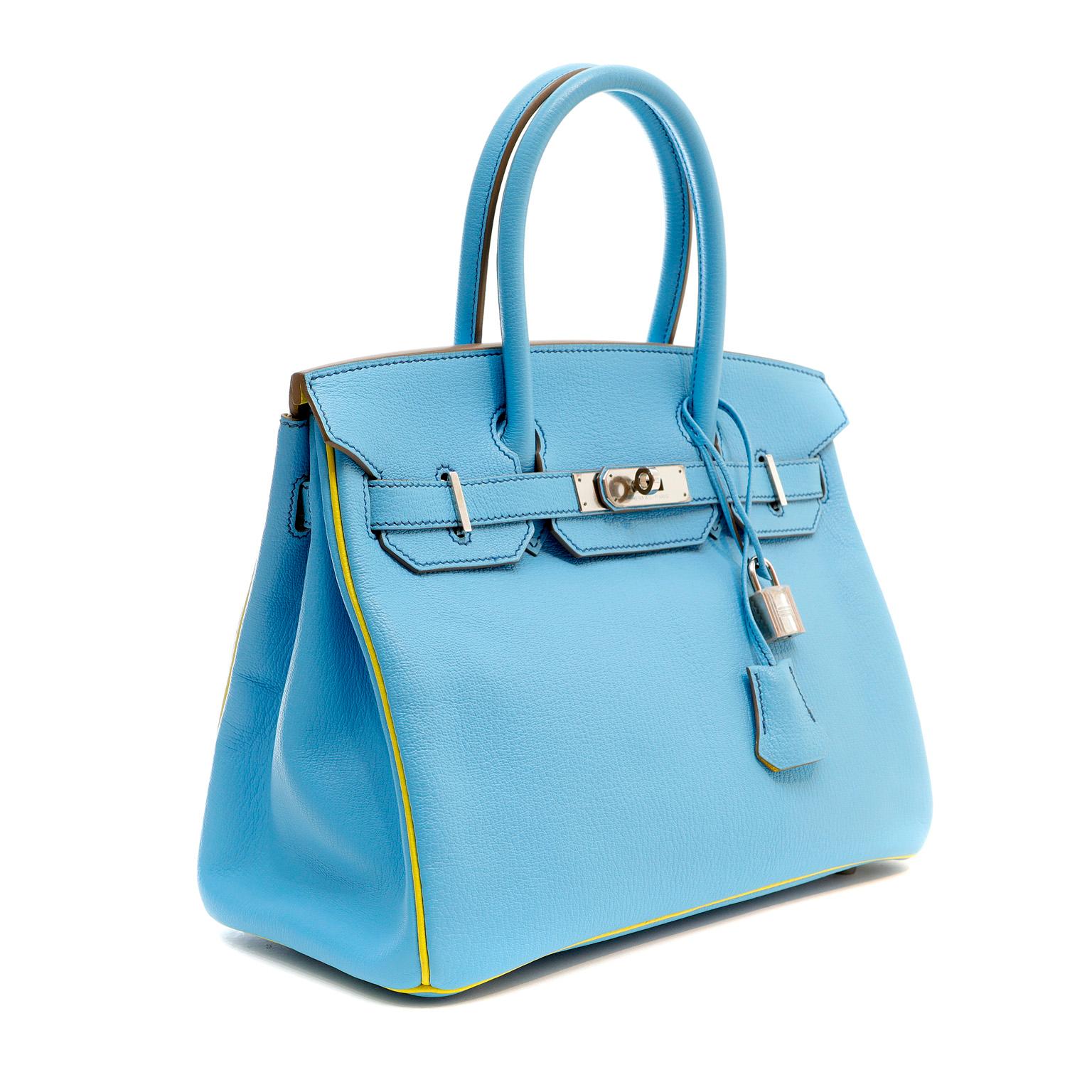 This authentic Hermès Turquoise and Lime Green Horseshoe Chevre 30 cm Birkin is in pristine unworn condition.  Specially ordered, Horseshoe Birkins are extremely rare and only offered to select clientele.    

Vibrant Turquoise chevre (goat hide) is
