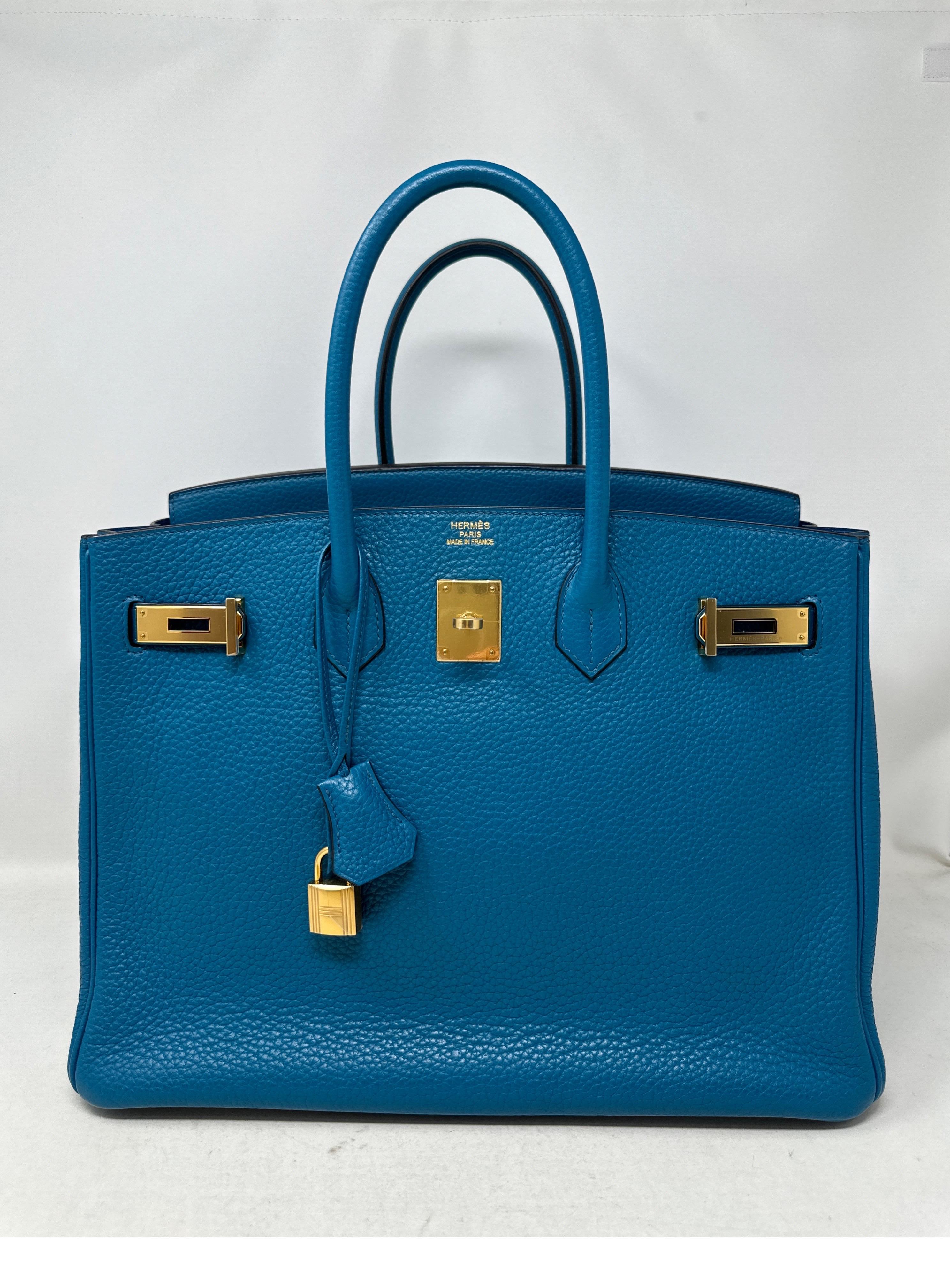 Hermes Birkin 35 Turquoise Bag. Gold hardware. Q stamp. Excellent condition. Clemence leather. Interior clean. Stunning color and beautiful bag. Plastic is still on the hardware. Includes clochette, lock, keys, and dust bag. Guaranteed authentic.