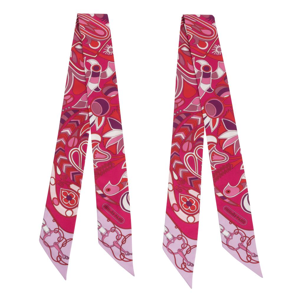 Guaranteed authentic Hermes silk scarf Twilly Set of 2 Folklore.
Beautiful combination of Fuchsia, Rose and Pink! 
Comes with signature Hermes box and ribbon.
NEW or NEVER WORN
final sale

SIZE  32