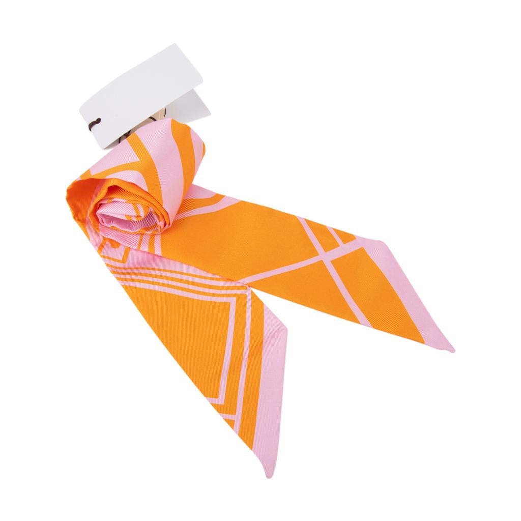 Mightychic offers a guaranteed authentic Hermes silk scarf twilly features Les Coupes Tattoo.
Soleil and Rose Pale creates this exquisite scarf.
This iconic Hermes accessory can be worn in a myriad ways to add a playful touch to your wardrobe.
And