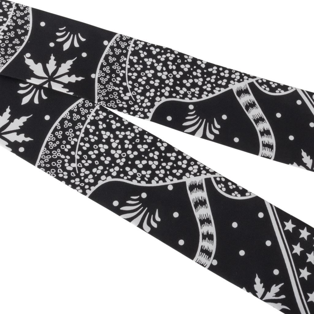 Guaranteed authentic Hermes Twilly set of 2 features Les Leopards Bandana.
Designed by Christiane Vauzelles
This iconic Hermes accessory can be worn in a myriad ways to add a playful touch to your wardrobe.
And of course express your own personality