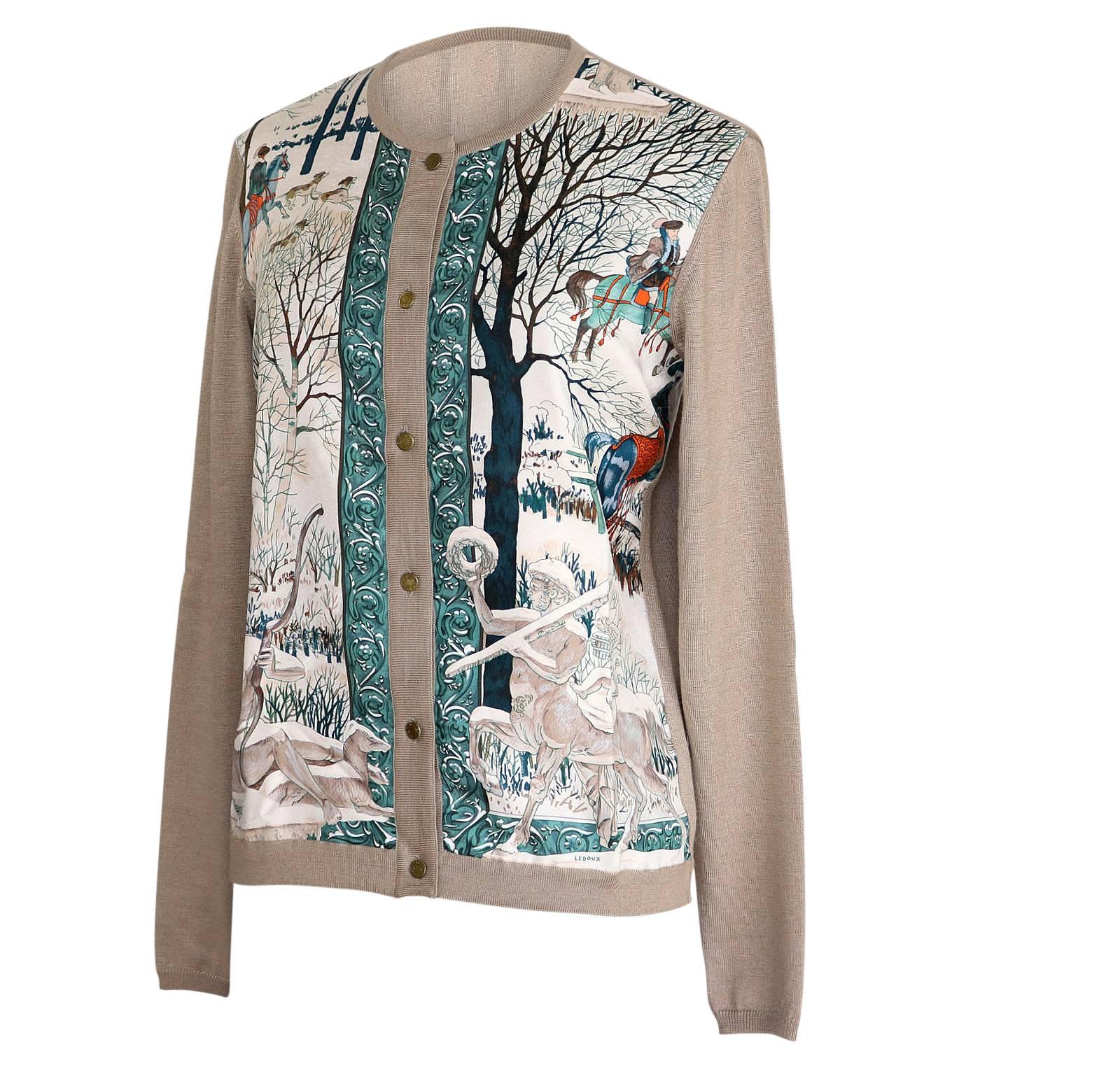 Mightychic offers an Hermes L'Hiver by Philippe Ledoux coveted scarf print twinset cardigan sweater and knit shell. 
The beautiful scarf print is in shades of teal, taupe and a touch of orange.
Rear of sweater is taupe cashmere and silk.
6 burnished