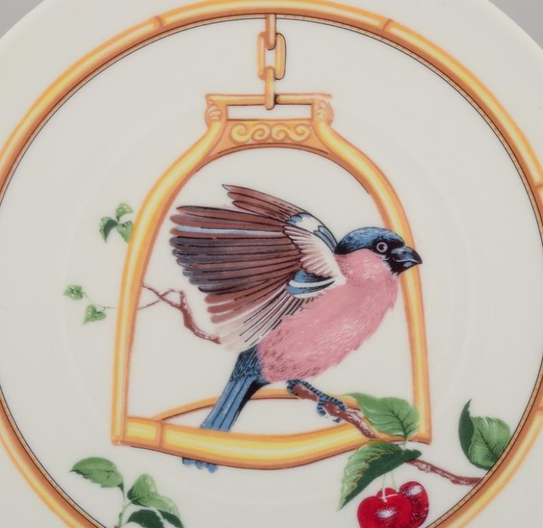 20th Century Hermès. Two porcelain plates with bird motifs. 