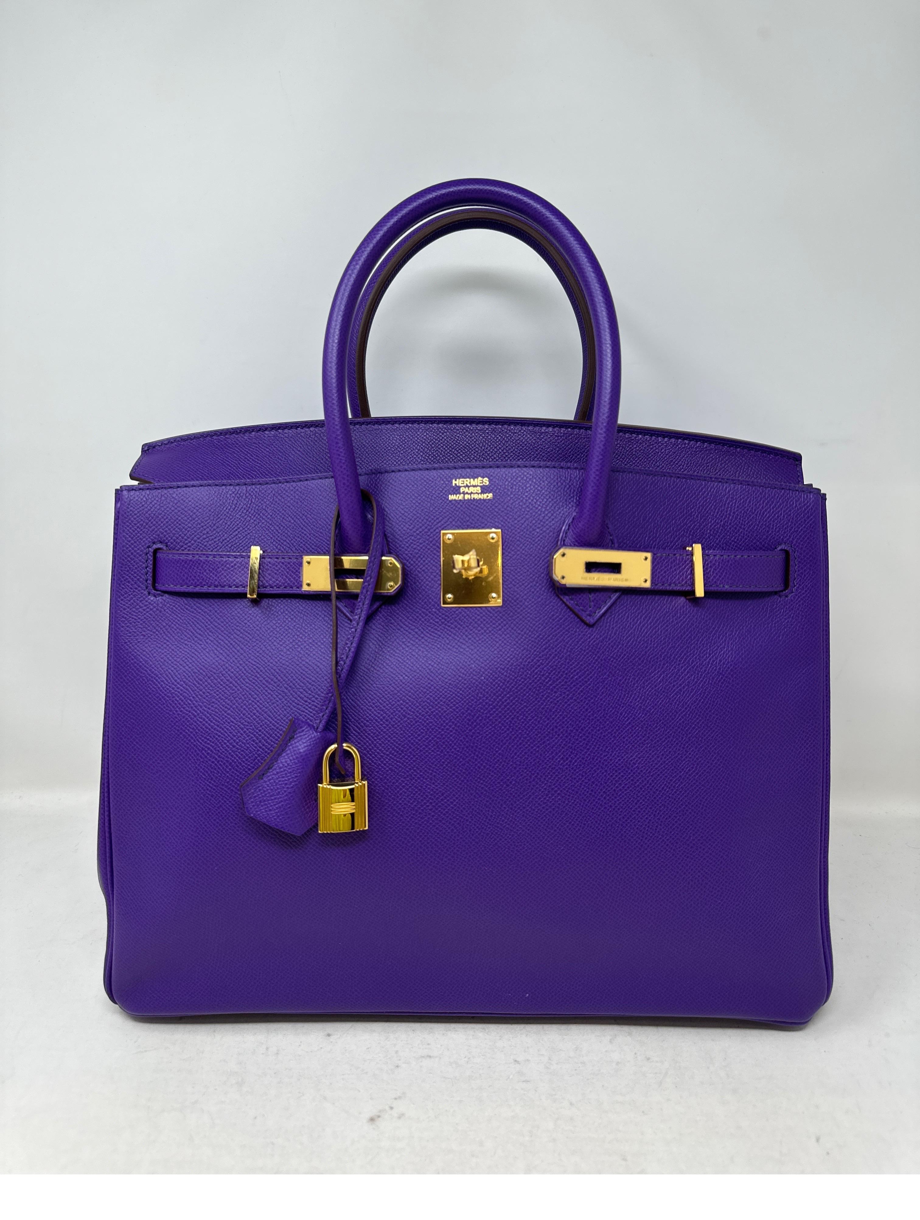 Hermes Ultra Violet Birkin 35 Bag. Gorgeous vibrant purple color Birkin. Gold hardware. Excellent condition. Epsom leather. Looks like new condition. Still has plastic on hardware. Hard to find combo. Interior clean. Stayed in the dust cover.
