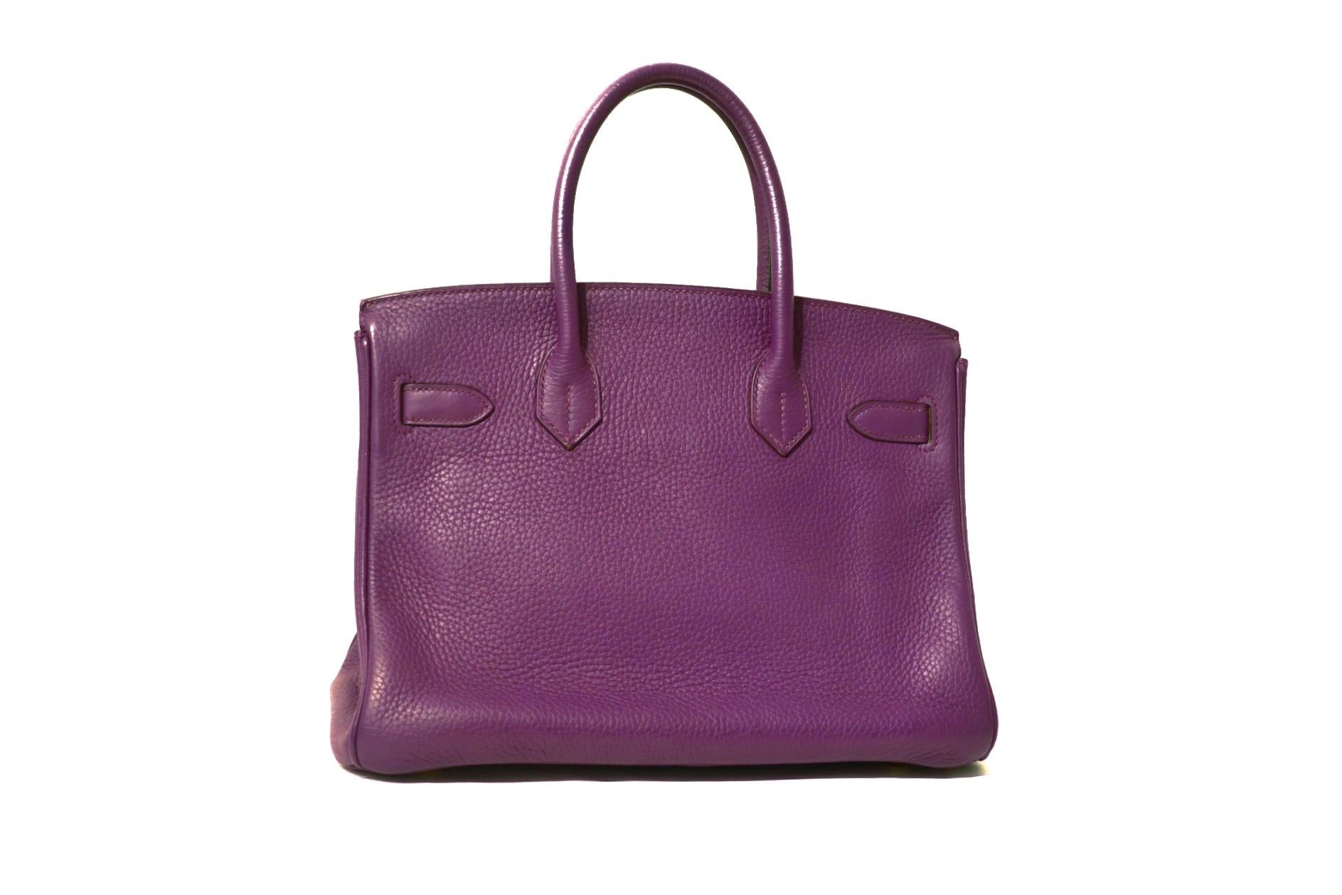 This authentic Hermès Ultraviolet Togo 30 cm Birkin is in excellent condition.    Hand stitched by skilled craftsmen, wait lists of a year or more are common for the Hermès Birkin. Ultraviolet Togo paired with gold hardware is a dream for purple