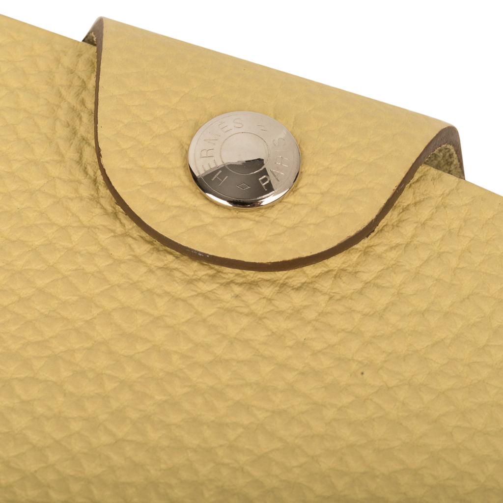 Mightychic offers an Hermes Ulysse mini model notebook cover featured in Jaune Poussin.
Togo leather with Palladium Clou de Selle  snap. 
Comes with a new Ulysse lined notebook refill.   
The perfect companion for your bag and desk.
Wonderful