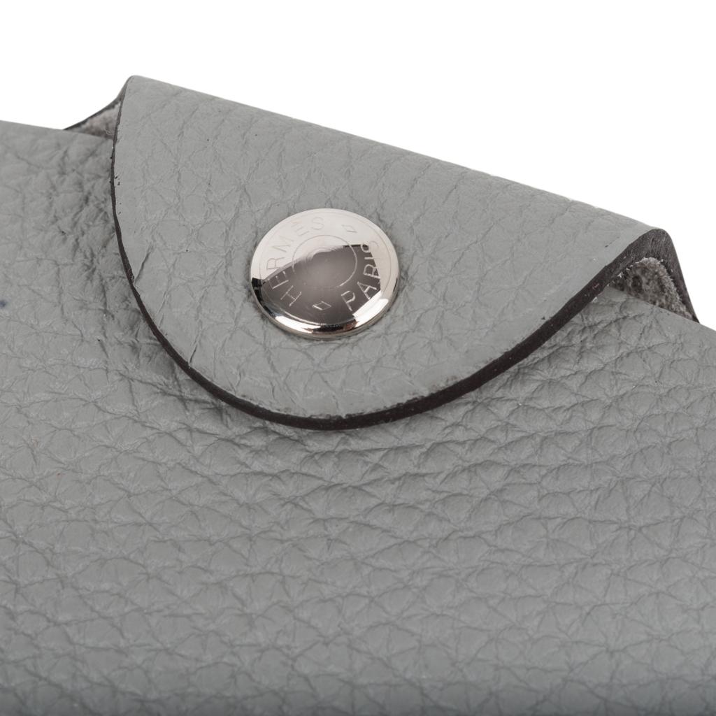 Guaranteed authentic Hermes Ulysse PM model notebook cover features Gris Mouette togo leather.
Palladium Clou de Selle  snap. 
Comes with a new notebook lined refill. 
Each item comes with the signature Hermes box and ribbon.
New or Store Fresh