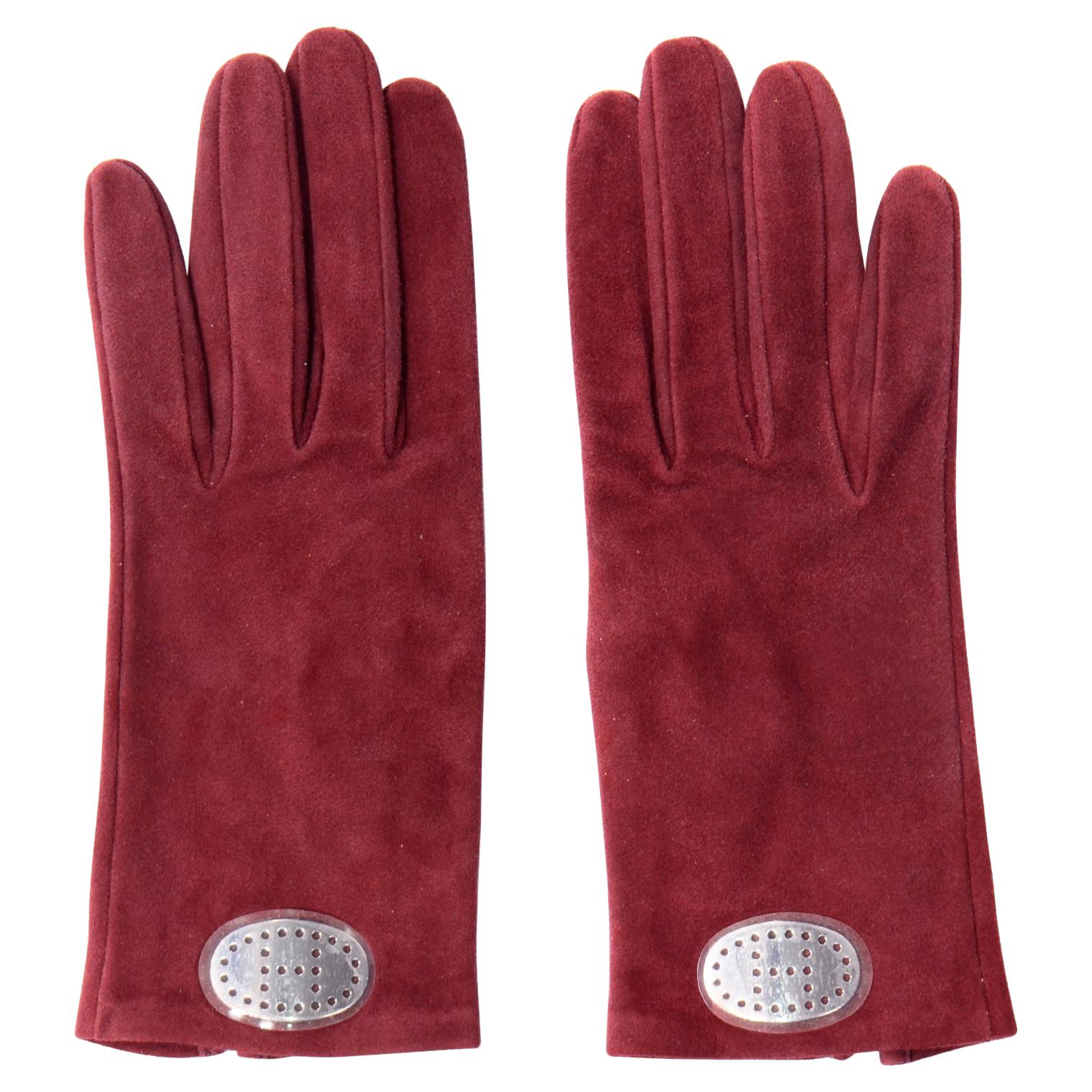 Hermes Unworn Burgundy Wine Red Suede Gloves w Pierced H Silver Oval