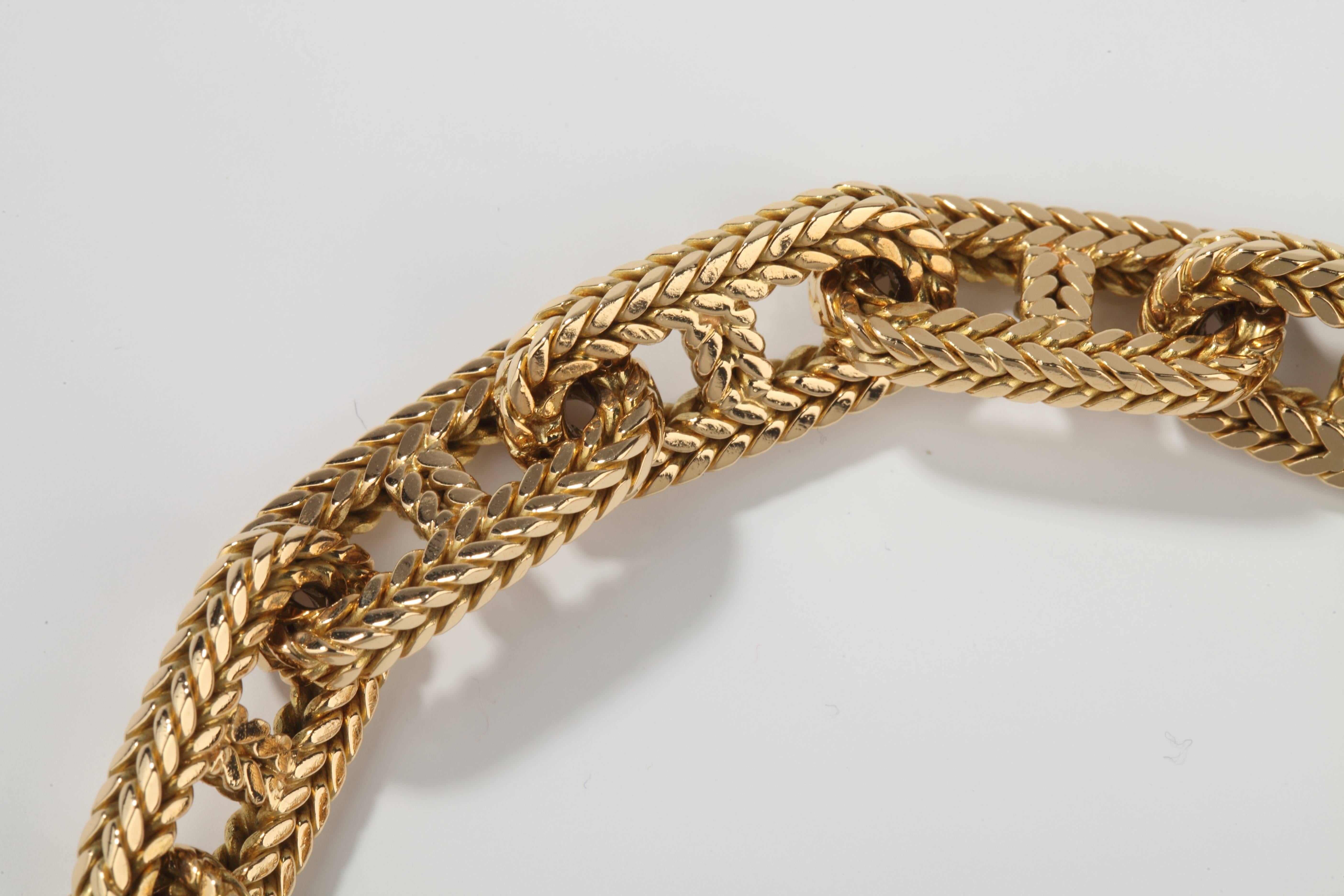 Yellow gold (18K) toggle link bracelet in the Chaine d'ancre collection in tresse gold. Large model.
Made and marked by G.LENFANT.

Signed HERMES and number.
French assay mark.
Delivered with an Hemes orange box.