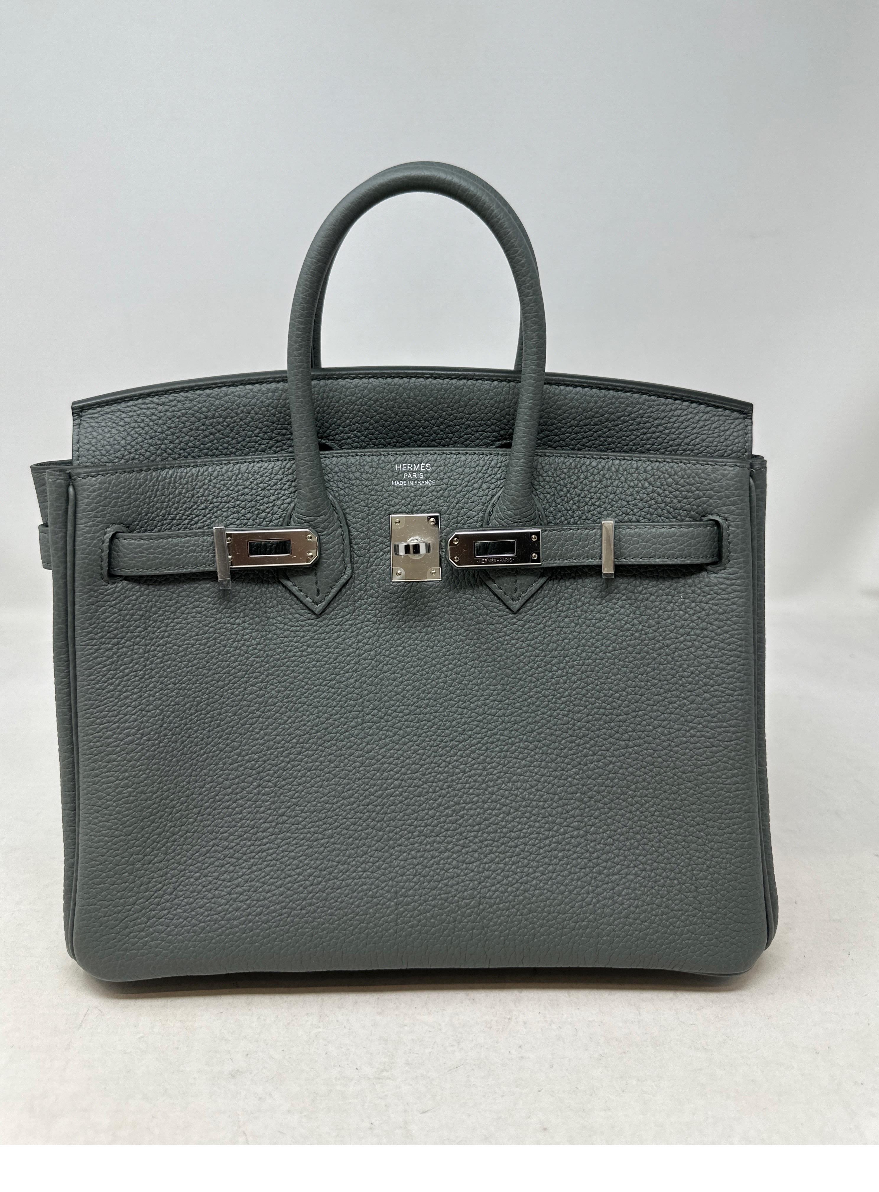 Hermes Vert Amande Birkin 25 Bag. Brand new. Rare light grey green color. Togo leather. Palladium silver hardware. Includes clochette, lock, keys, dust bag and box. Full set. Guaranteed authentic. 