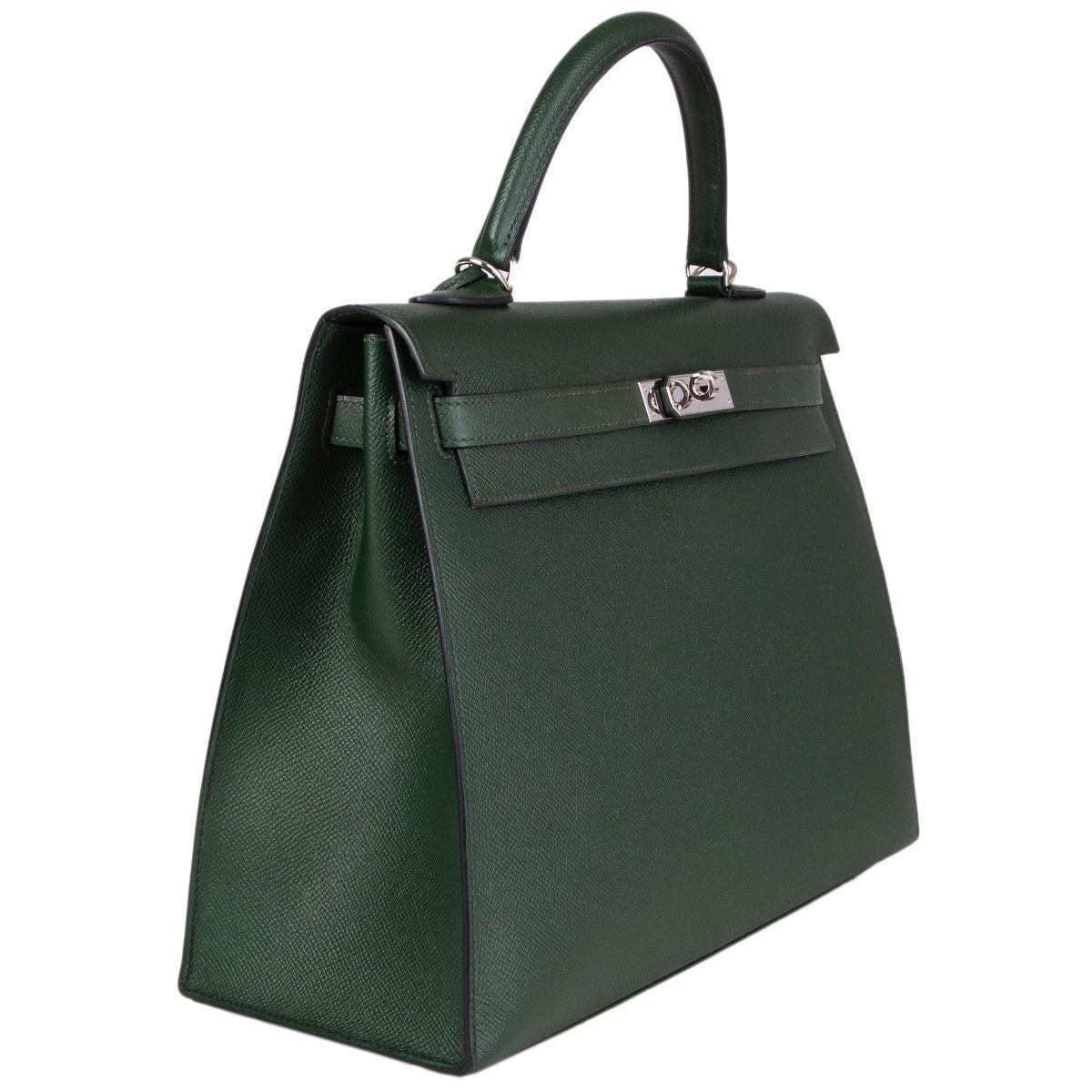 Hermès 'Kelly II 35 Sellier' in Vert Anglais Veau Epsom leather with palladium hardware. Removable shoulder strap. Closes with a turn-lock and straps on the front. Lined in Vert Anglais Chevre (goat skin) with two open pockets against the front and