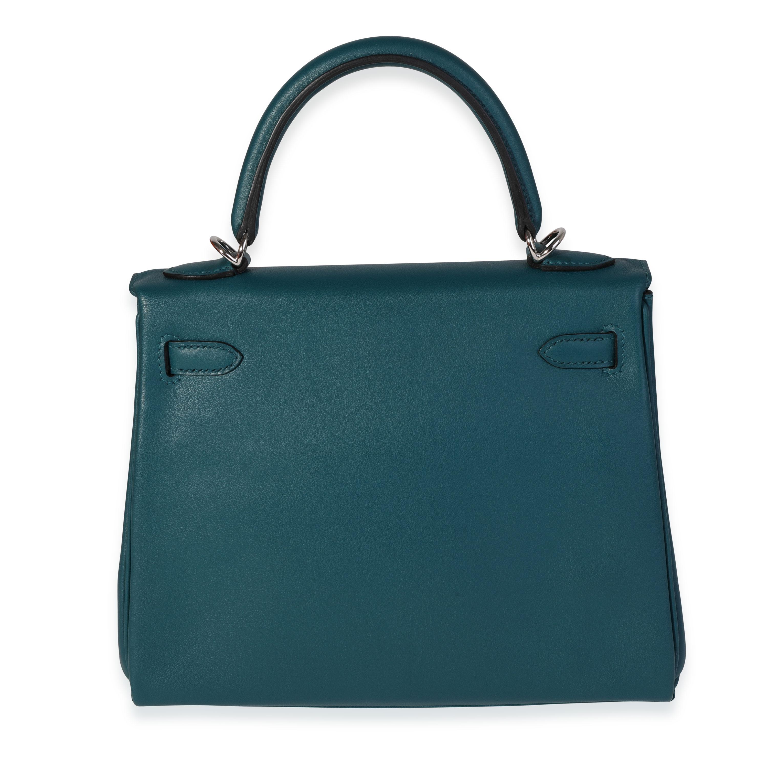 Listing Title: Hermès Vert Bosphore Swift Retourne Kelly 25 PHW
SKU: 120648
Condition: Pre-owned (3000)
Handbag Condition: Excellent
Condition Comments: Excellent Condition. Light scuffing to leather. No other visible signs of wear.
Brand: