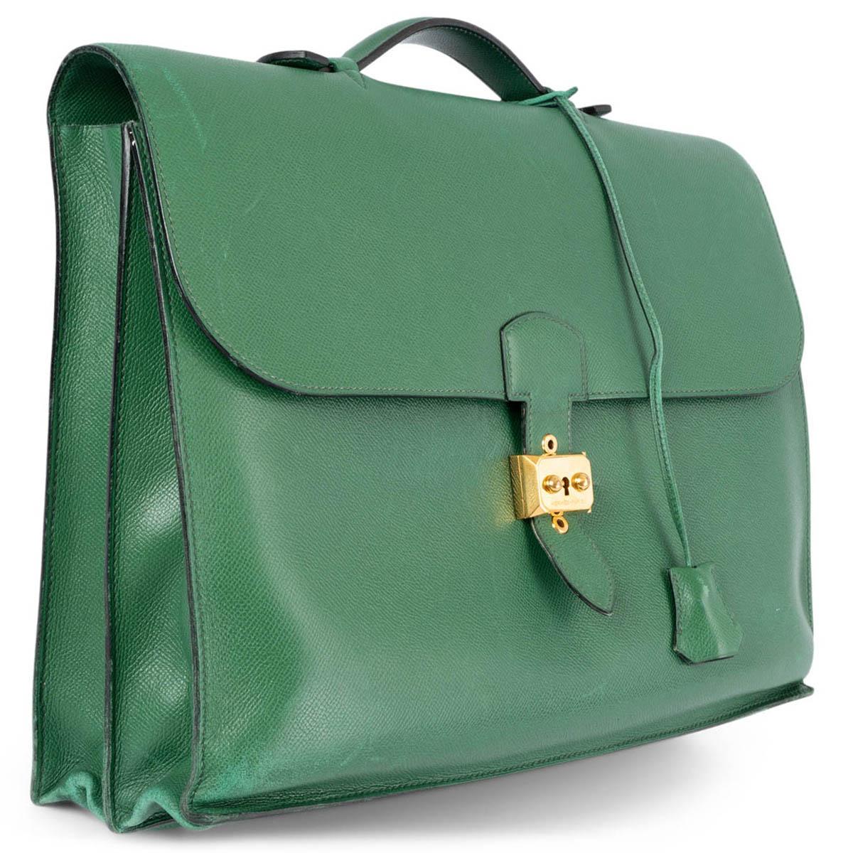 100% authentic Hermès Sac a Depeches 2-38 briefcase in Vert Claire green Veau Courchevel leather featuring gold-plated flip-lock buckle. Interior is unlined and has two main compartments and a big flat pocket on front under the flap. Vintage - has