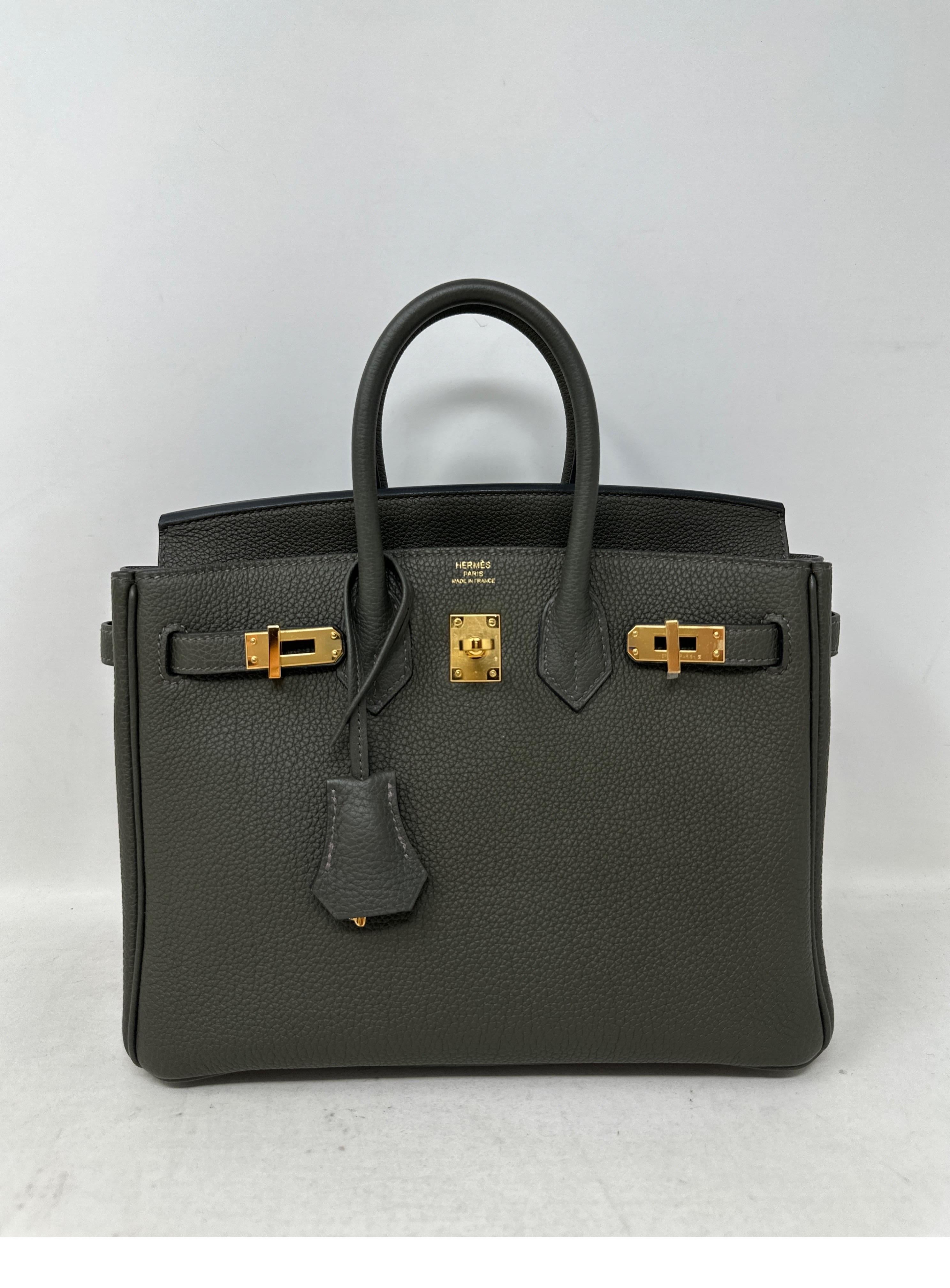 Hermes Vert De Gris Birkin 25 Bag. Brand new Birkin 25. Almost impossible to get size. Gold hardware. Gorgeous dark grey green color. Mini 25 size. Great evening bag. Or can be worn everyday. Full set. New with clochette, lock, keys, dust bag and