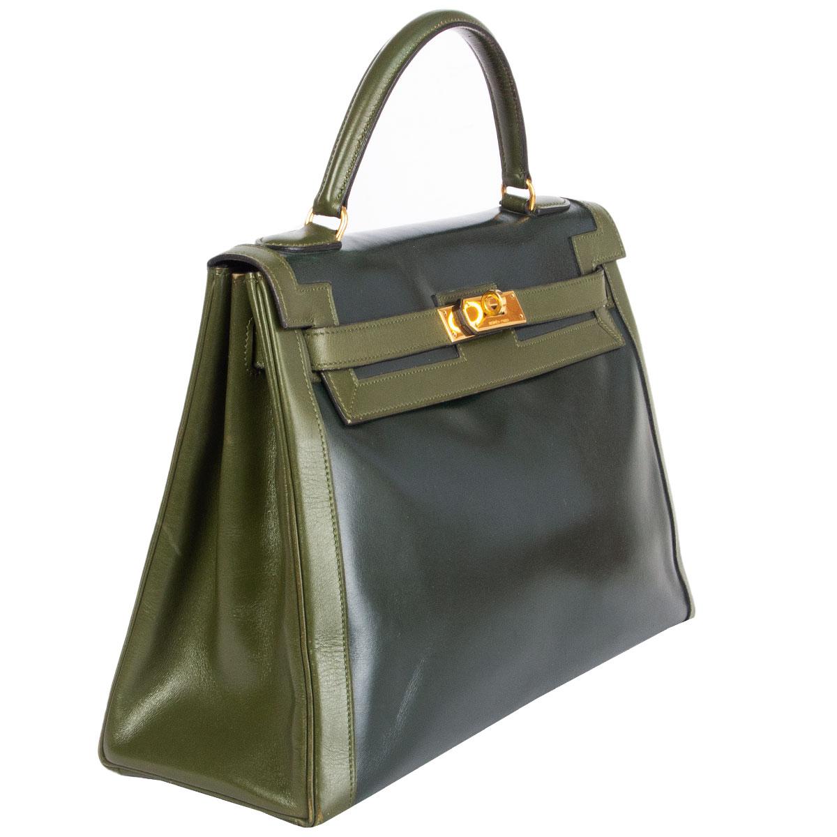 100% authentic Hermes Kelly I 32 Retourner Bi-Color bag in Vert Fonce (dark green) Veau Box leather with leaf green trimming and handle. Super rare color combination from 1981. Gold-plated hardware. Lined in Vert Fonce Chevre (goat skin) with two