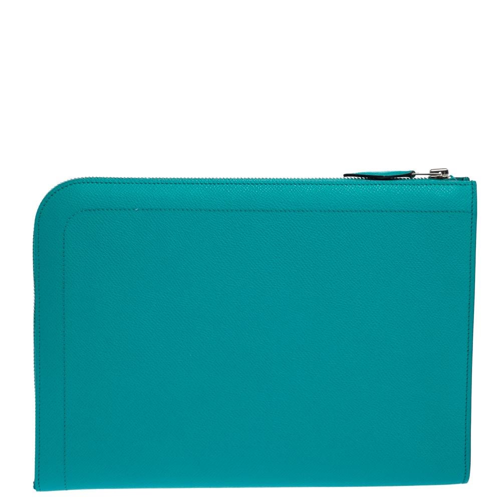 The luxurious craftsmanship of the house of Hermes makes this tablet case a perfect piece for the chic and stylish woman. Crafted in Epsom leather, this green-hued case is accented with a zip-around fastening and functional fabric-lined insides.