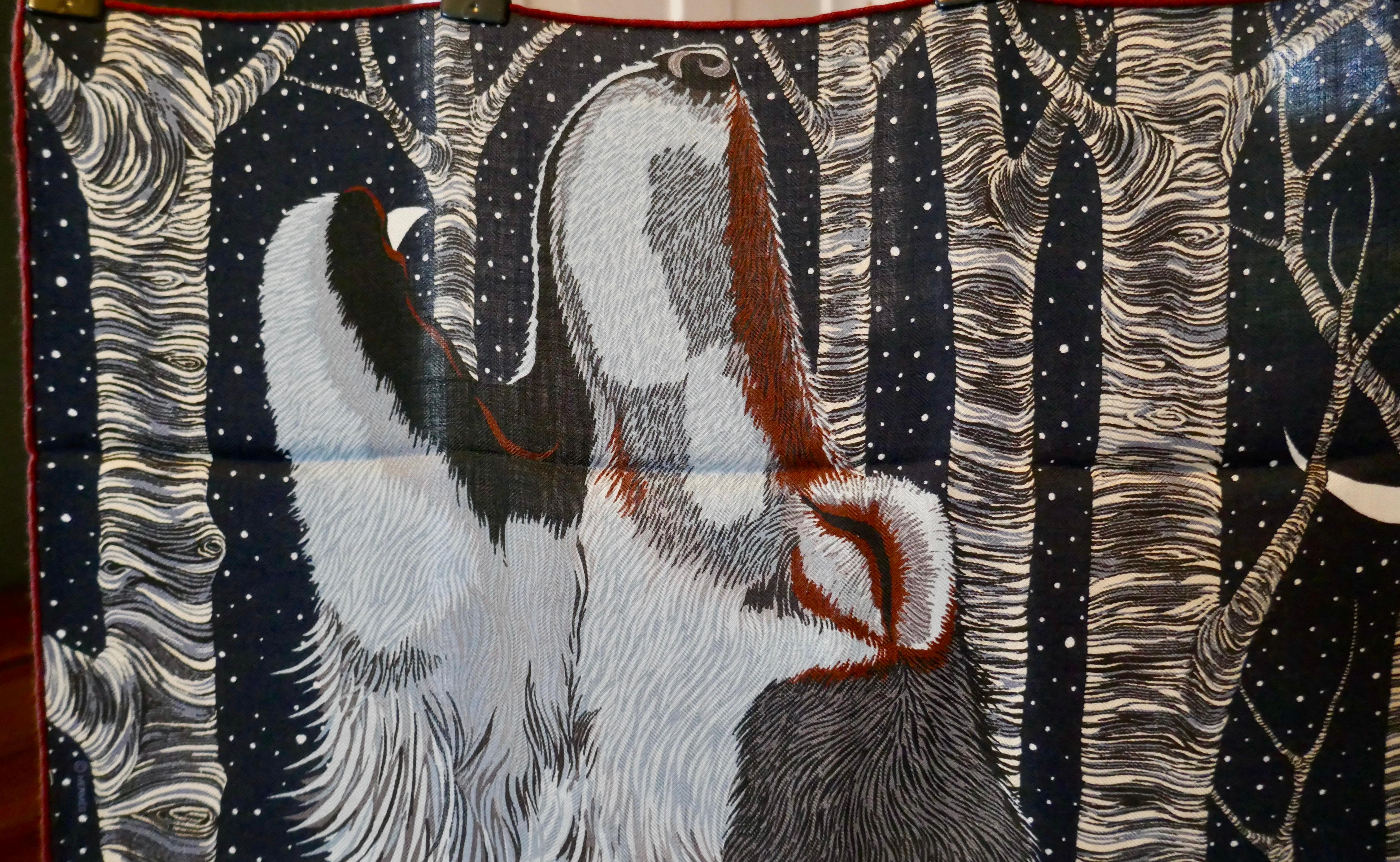 Hermes Very Special Issue Cashmere and Silk Scarf “AW00000” by Alice Shirley  

In a Burgundy and navy Pallet he is howling at the new moon, the design is by Alice Shirley issued in 2018 Luxurious cashmere scarf with little silk in the mix