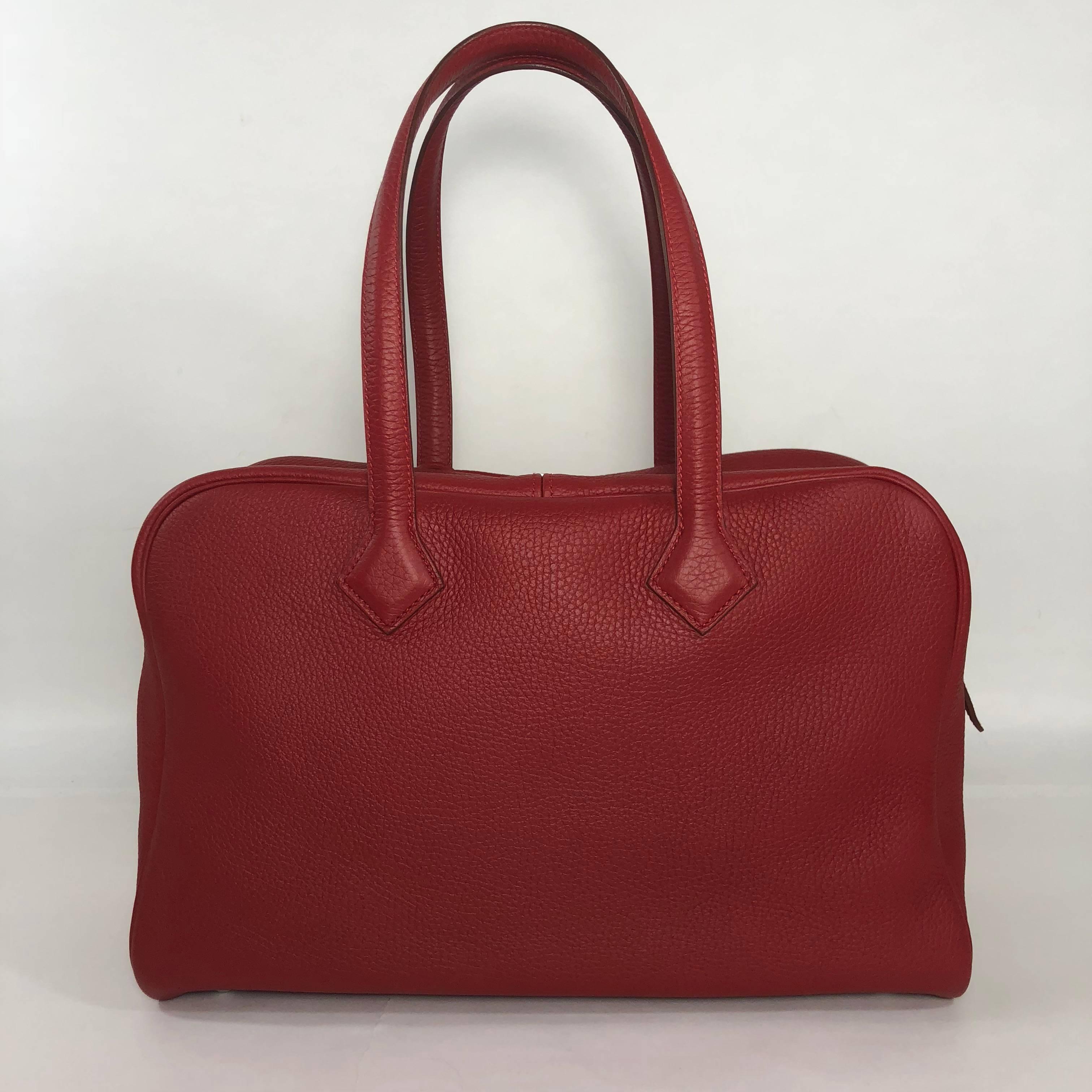 MODEL - Hermes Victoria Clemence Leather Handbag with Palladium Hardware in Red

CONDITION - Exceptional.  No visible signs of wear anywhere.

SKU - 2155

ORIGINAL RETAIL PRICE - 5150 + tax

DATE/SERIAL CODE - 63 J P Square

ORIGIN -