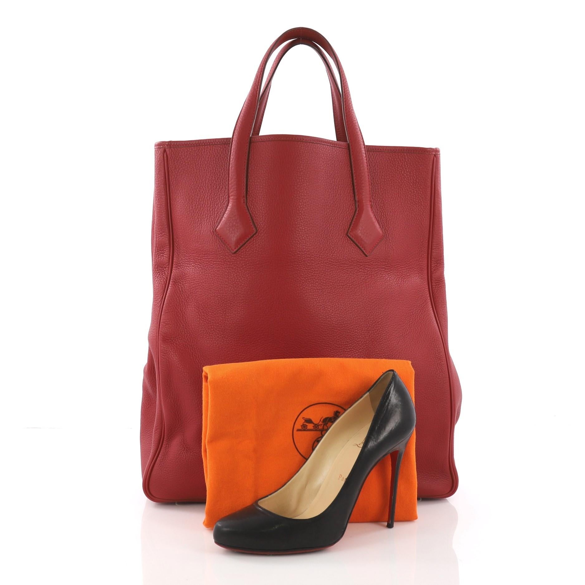 This Hermes Victoria II Cabas Clemence 35, crafted in Rouge Garance red clemence leather, features dual flat leather handles and palladium-tone hardware. It opens to a red leather interior with zip pocket. Date stamp reads: K Square (2007). **Note: