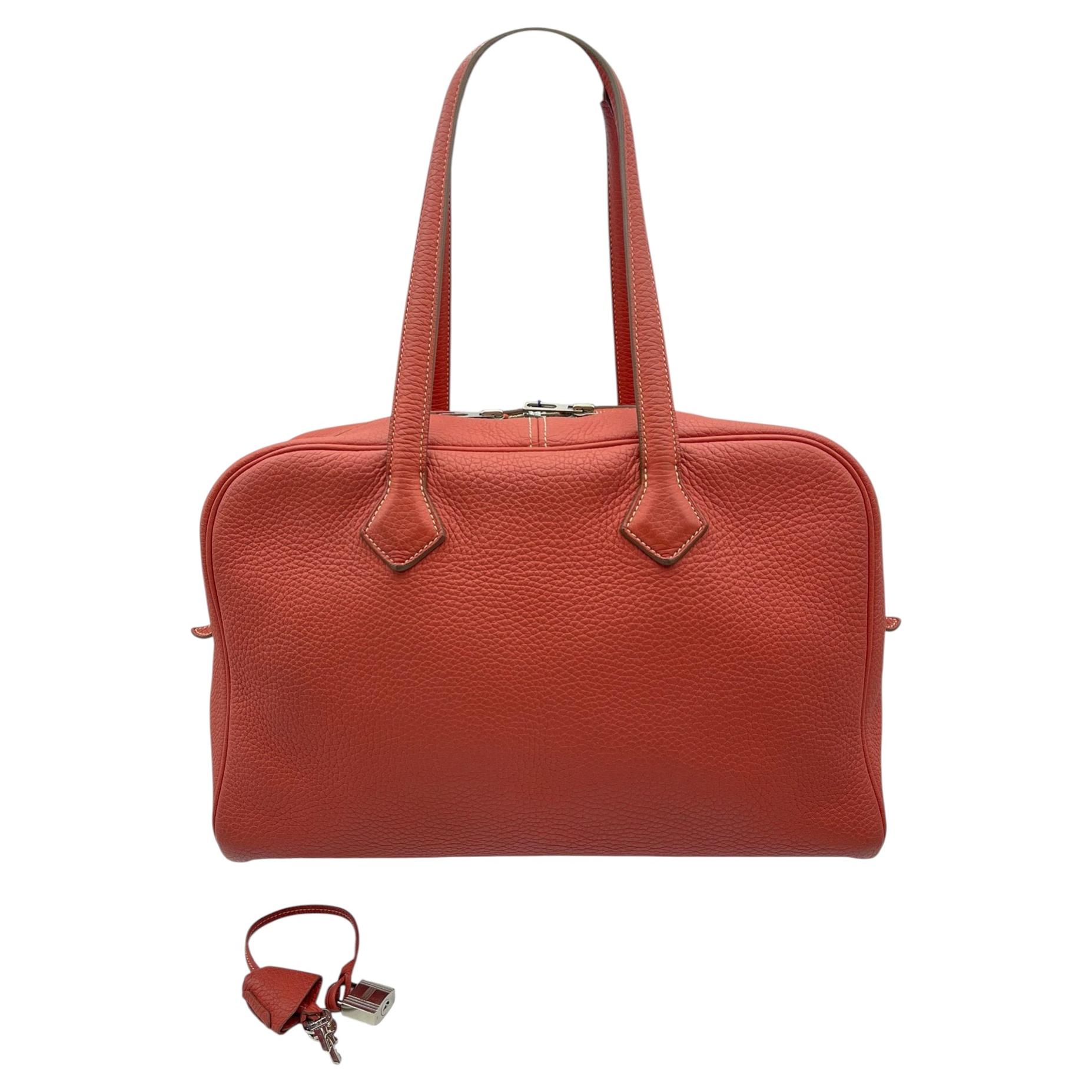Sac Hermès Victoria II Fourre-Tout 35, cuir Clemence rouge brique, finitions argentées, 2011