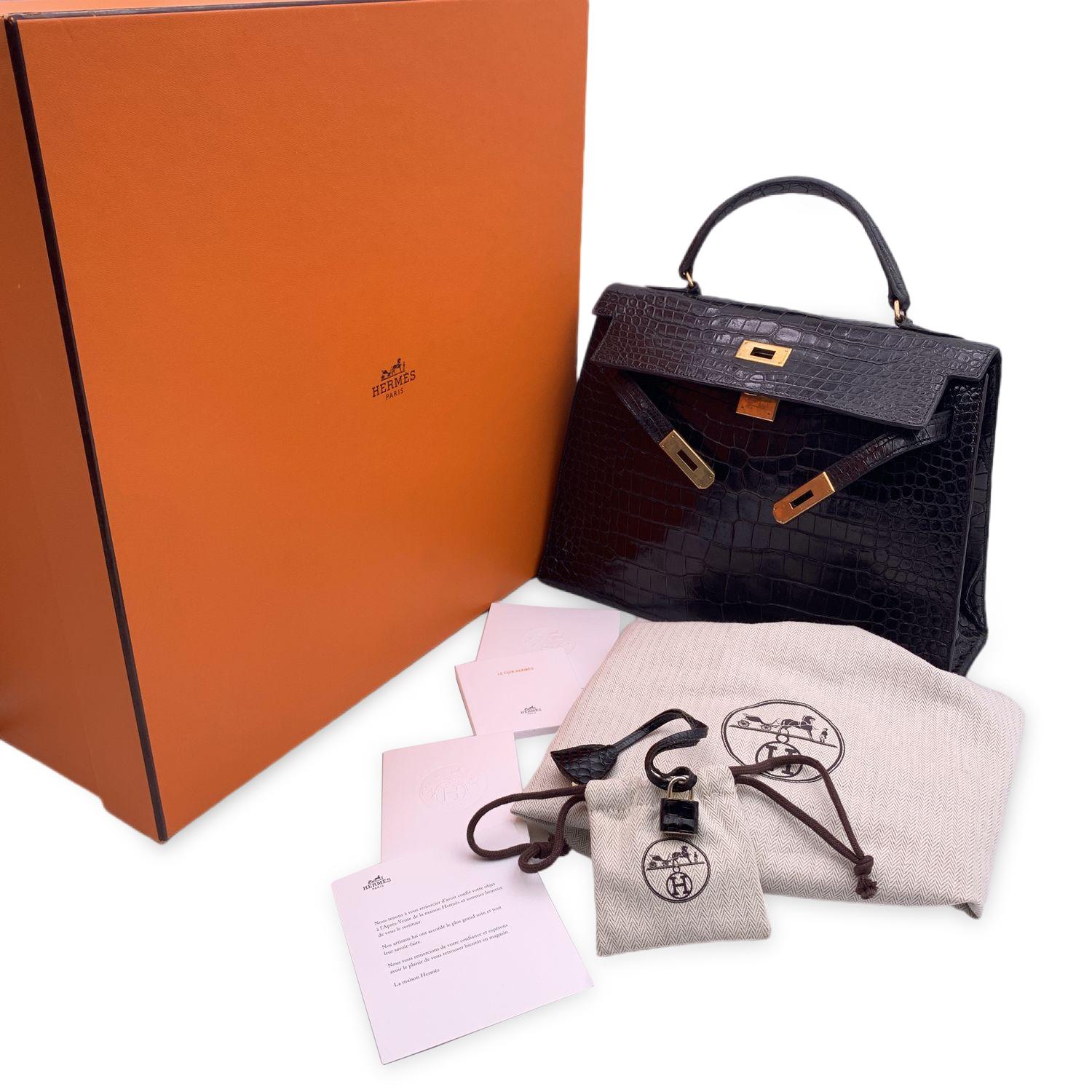 This beautiful Bag will come with a Certificate of Authenticity provided by Entrupy. The certificate will be provided at no further cost.

Timeless vintage Hermes 'Kelly 32 cm' bag crafted in black crocodile leather from the 1940s. The bag is from